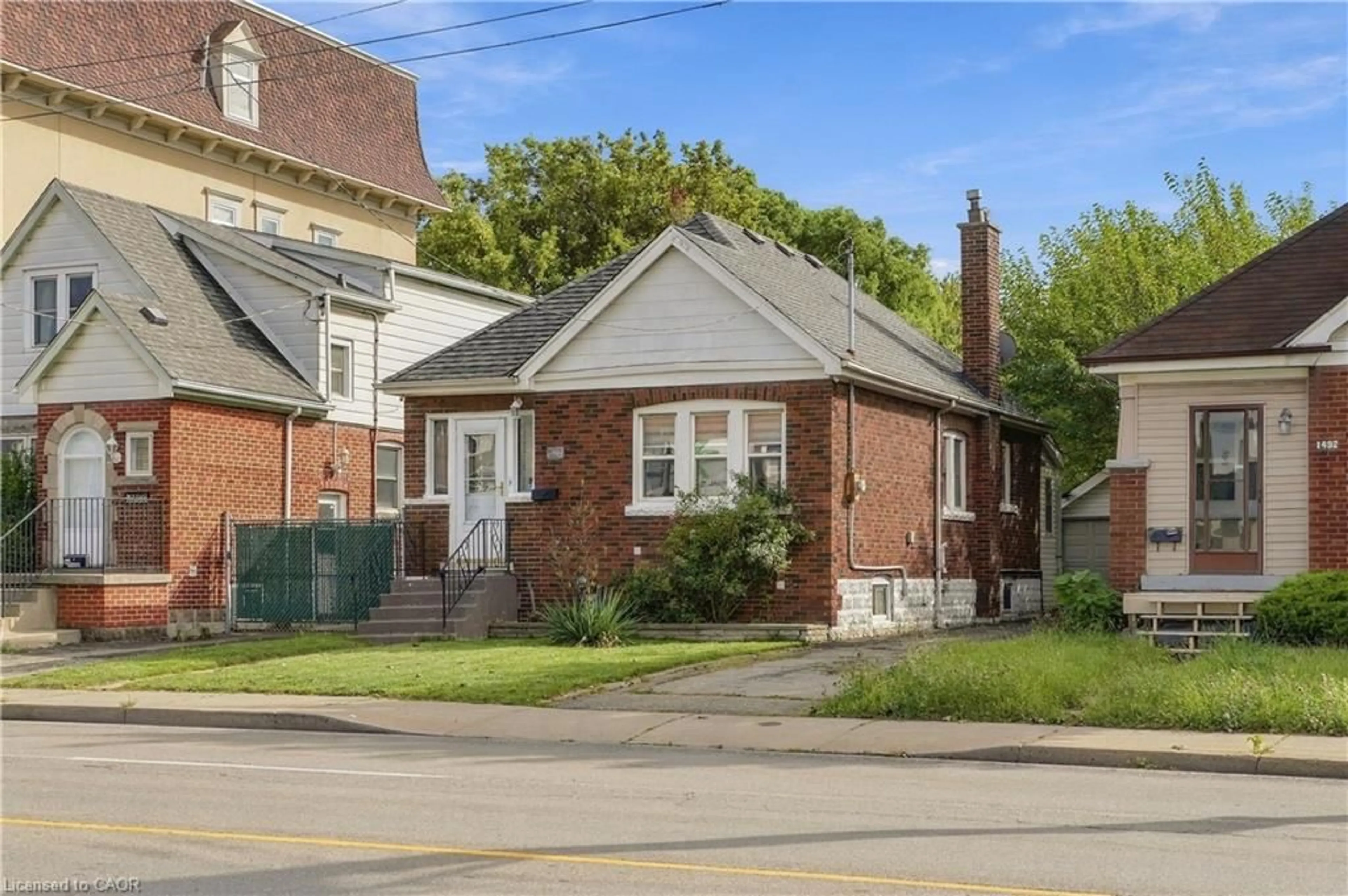 Home with brick exterior material, street for 1494 Main St, Hamilton Ontario L8K 1E1