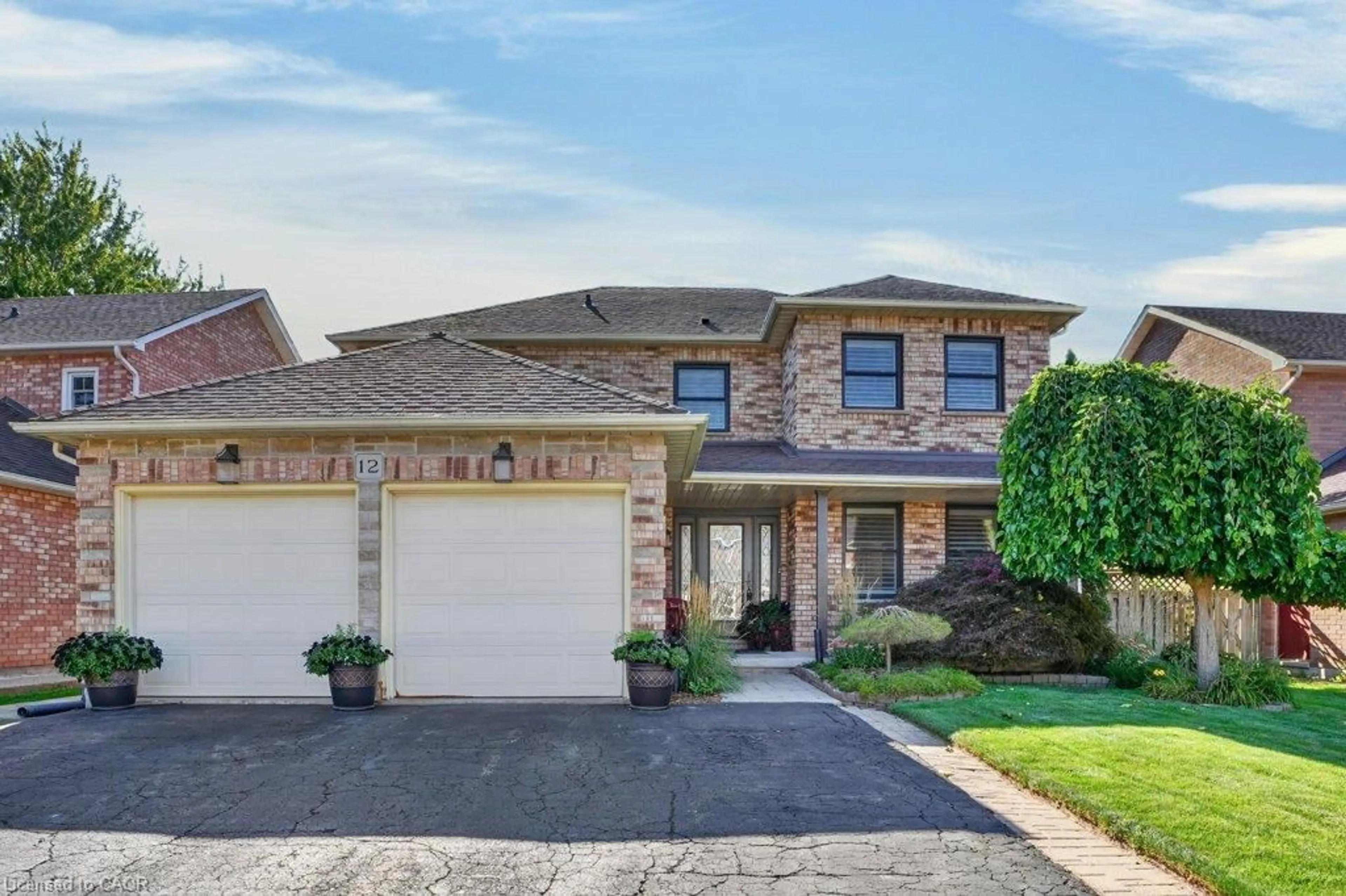Home with brick exterior material, street for 12 Beasley Cres, Cambridge Ontario N1T 1J9