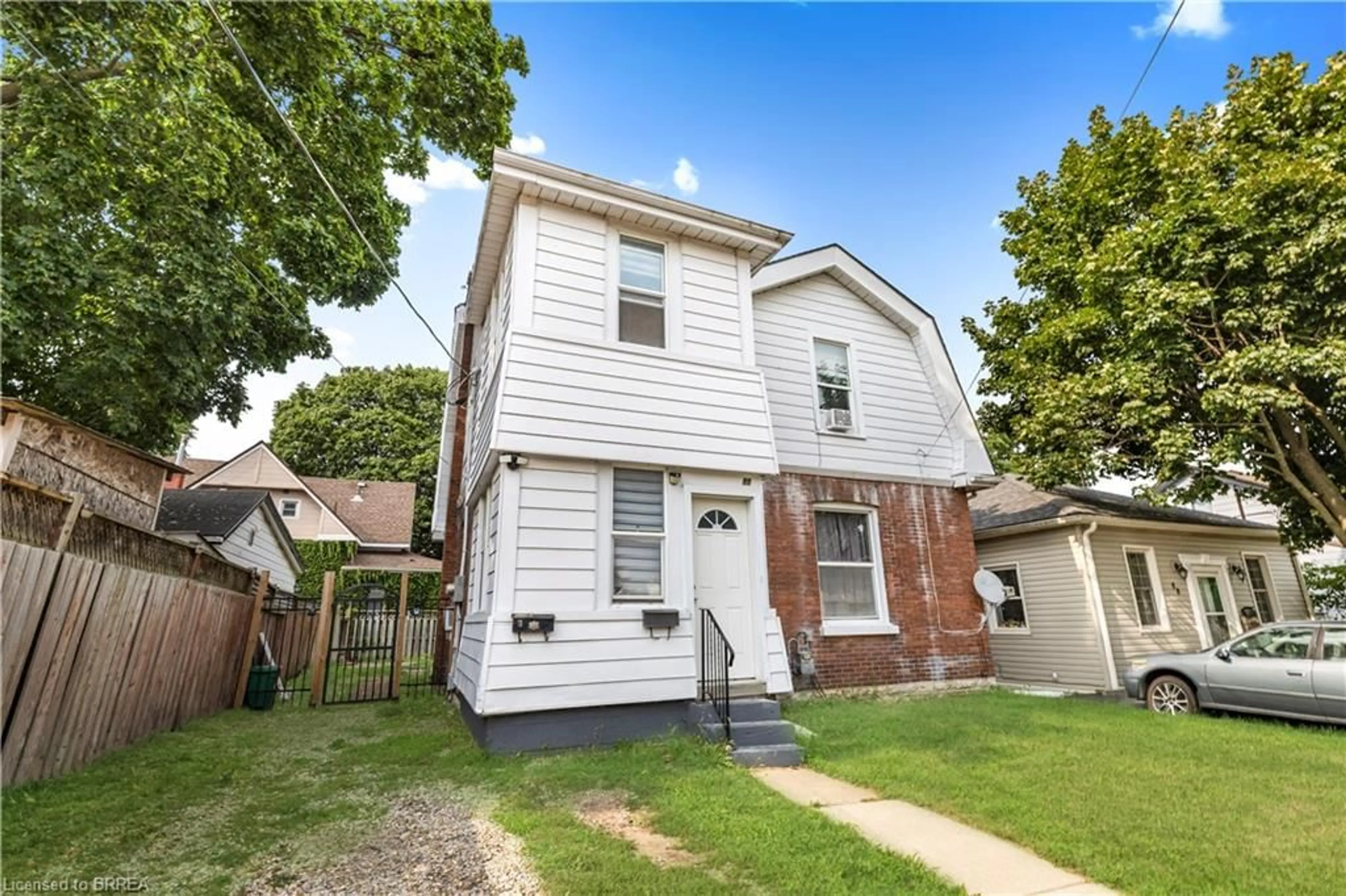 Home with brick exterior material, street for 86 Victoria St, Brantford Ontario N3S 3K6