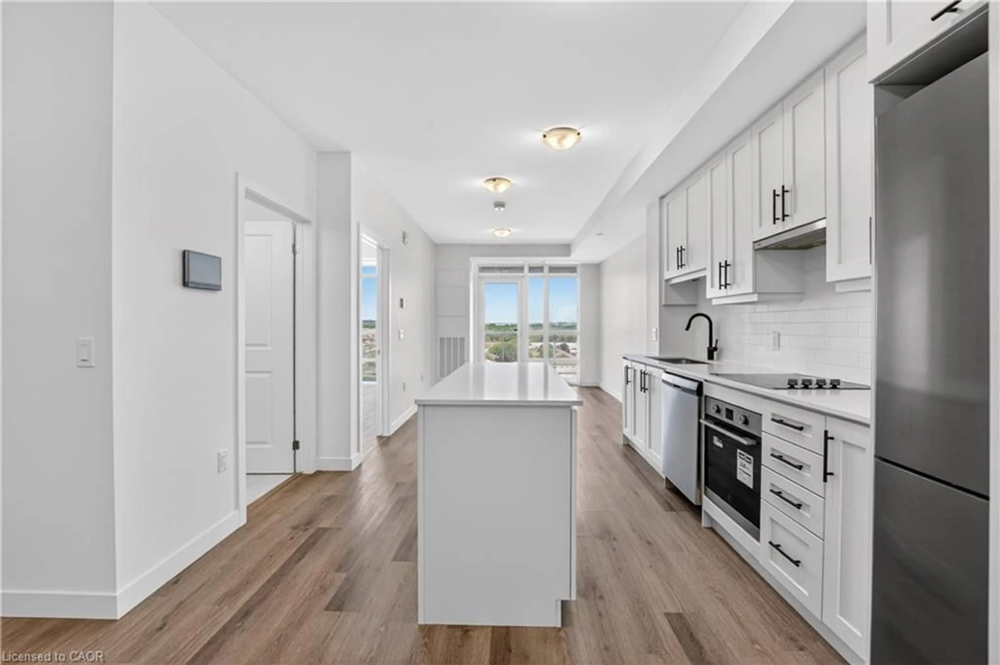 Open concept kitchen, ceramic/tile floor for 461 Green Rd #703, Stoney Creek Ontario L8E 0L5