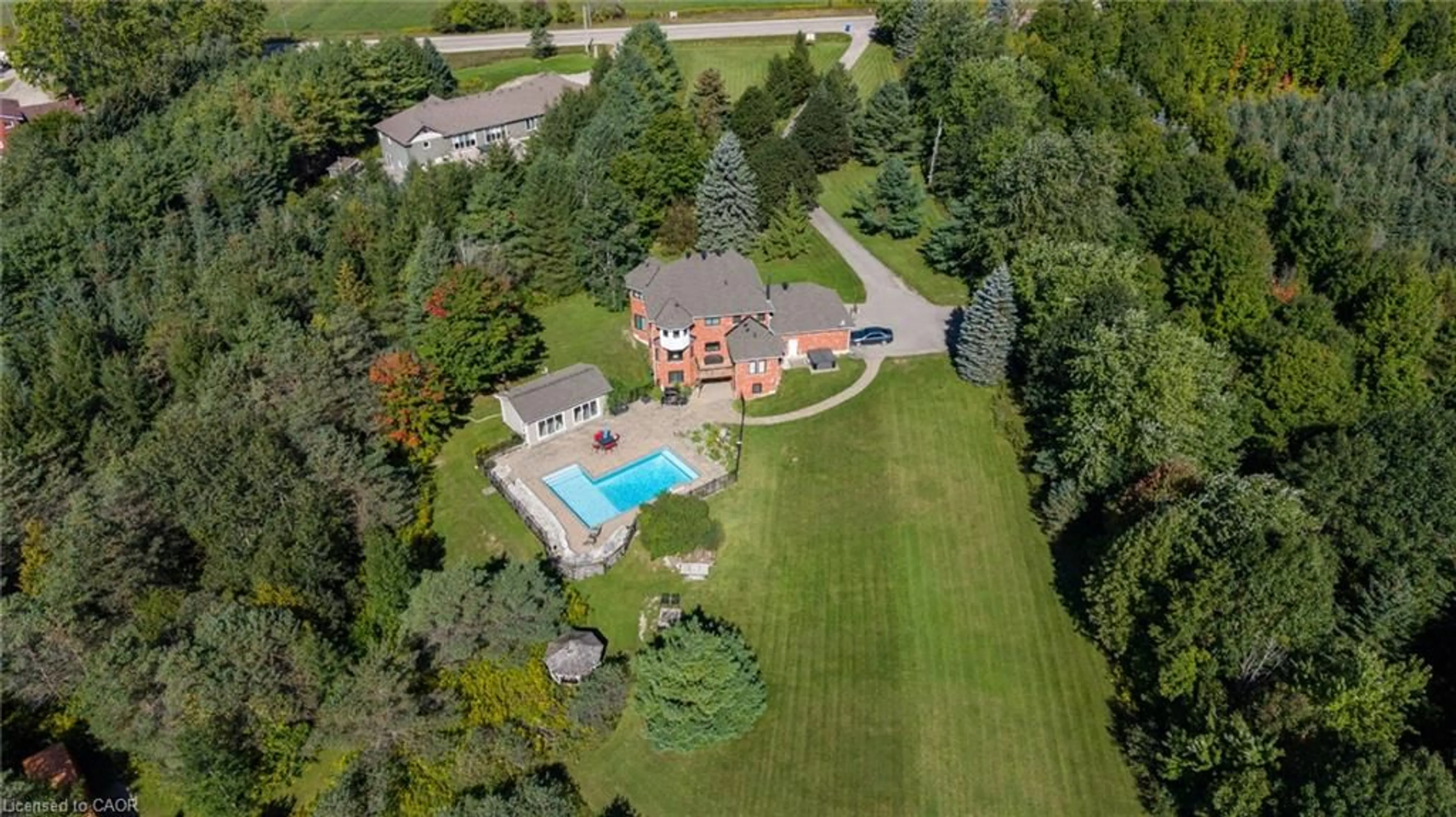 A pic from outside/outdoor area/front of a property/back of a property/a pic from drone, street for 9343 Wellington Rd 22, Wellington Ontario N0B 1Z0