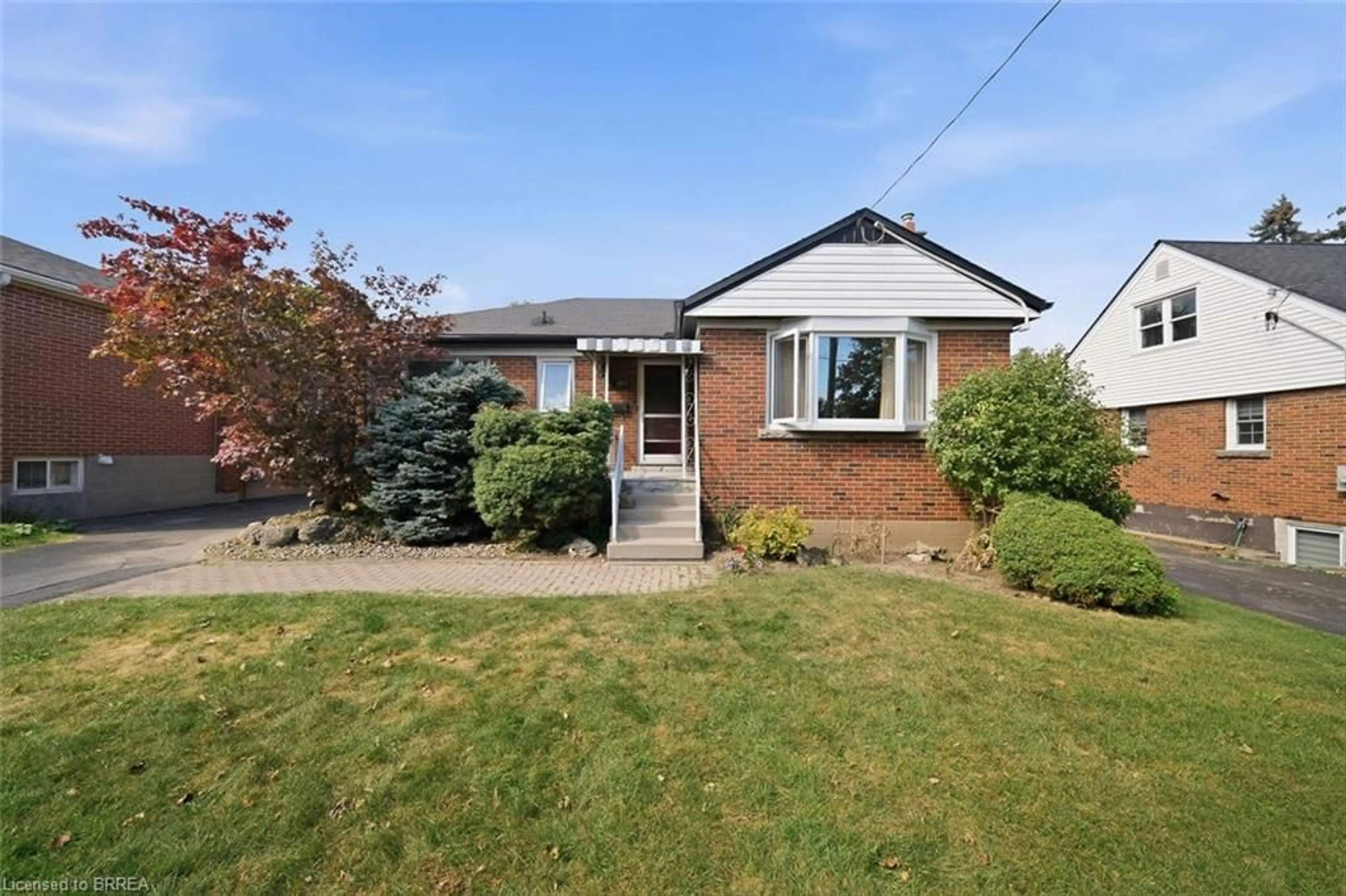 Home with brick exterior material, street for 138 West 23rd St, Hamilton Ontario L9C 4V7
