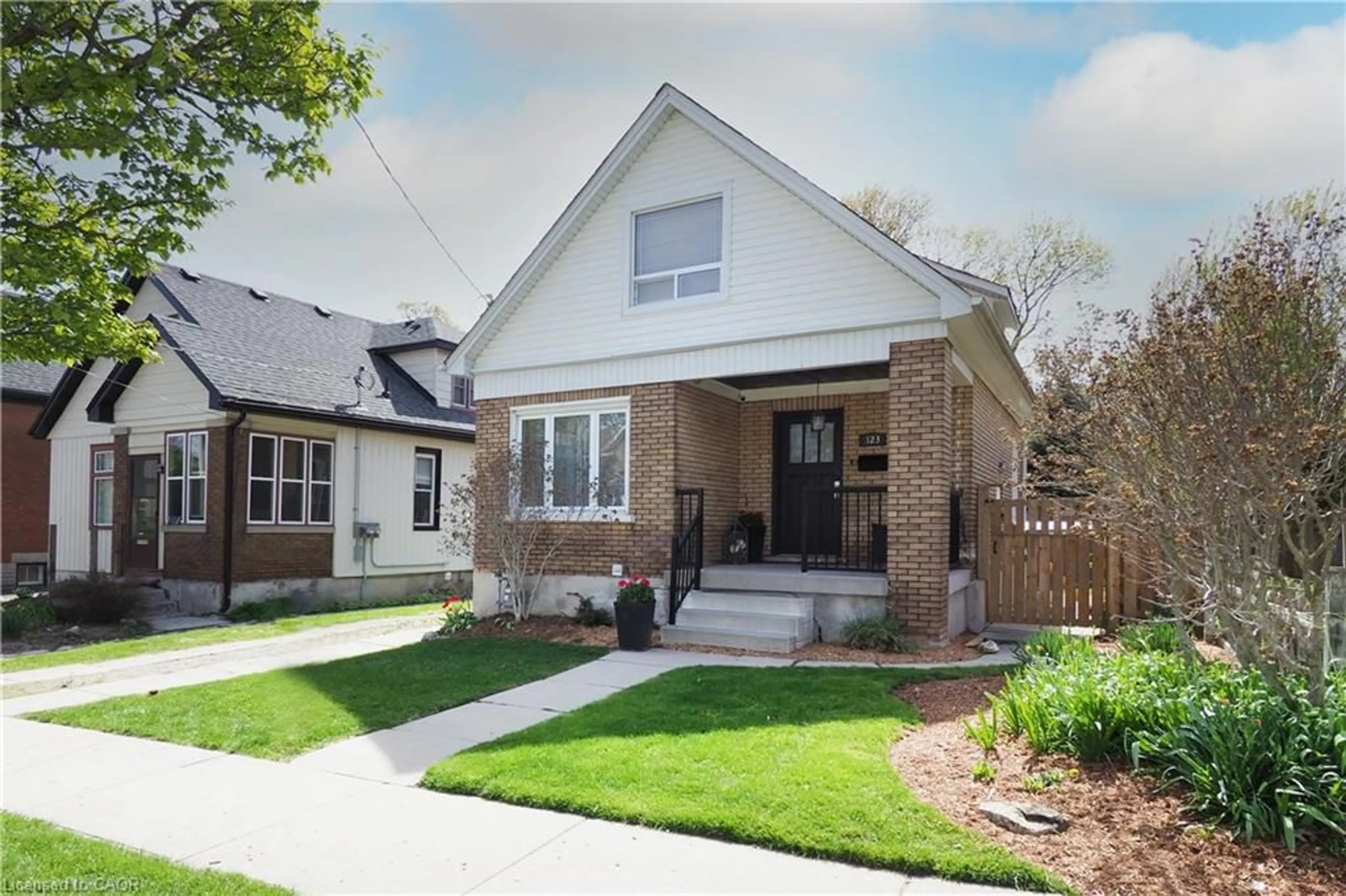 Home with brick exterior material, street for 123 Samuel St, Kitchener Ontario N2H 1P9