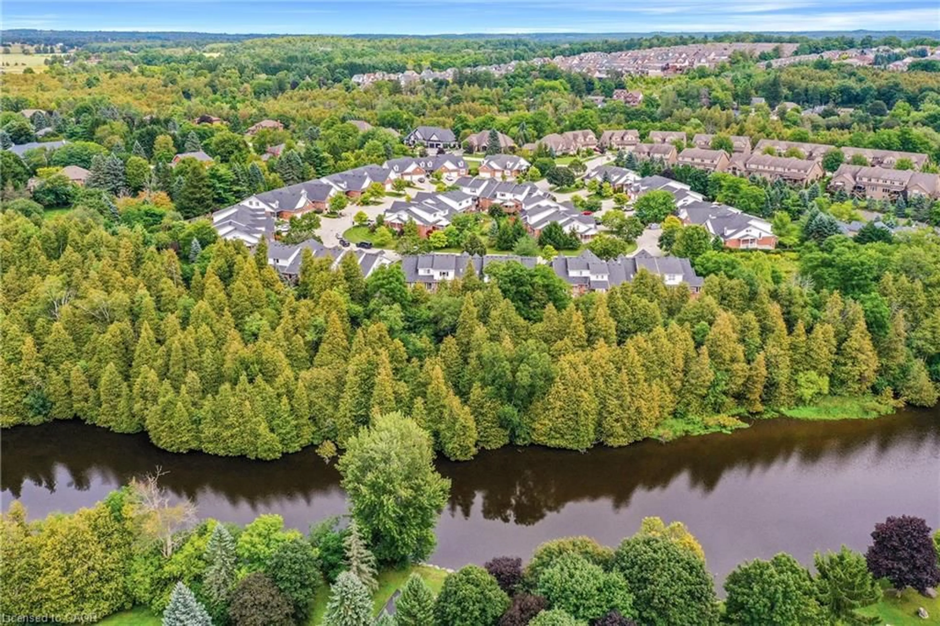 A pic from outside/outdoor area/front of a property/back of a property/a pic from drone, water/lake/river/ocean view for 125 Riverwalk Pl, Rockwood Ontario N0B 2K0