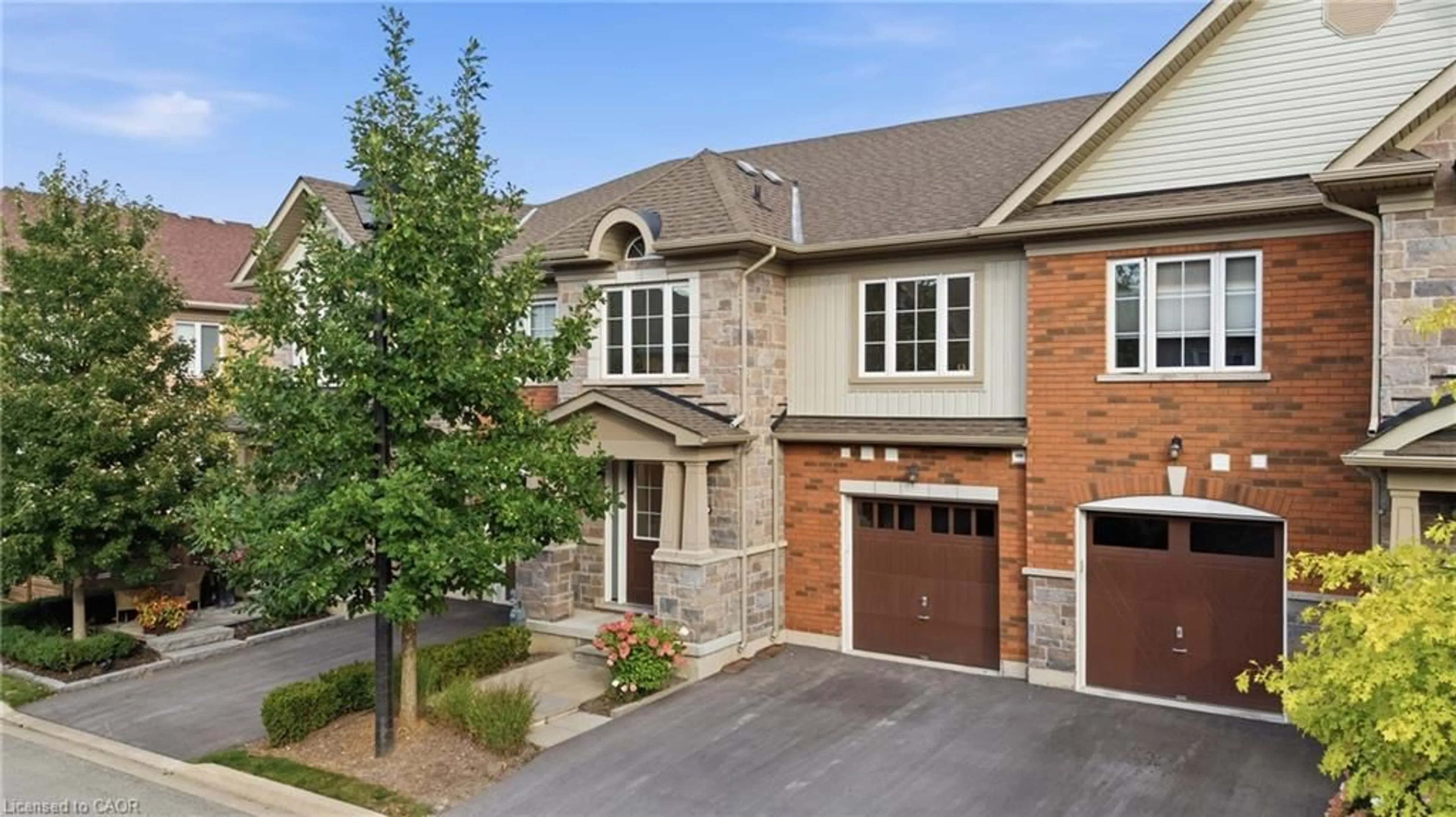 Home with brick exterior material, street for 12 George Manor, Niagara-on-the-Lake Ontario L0S 1J0