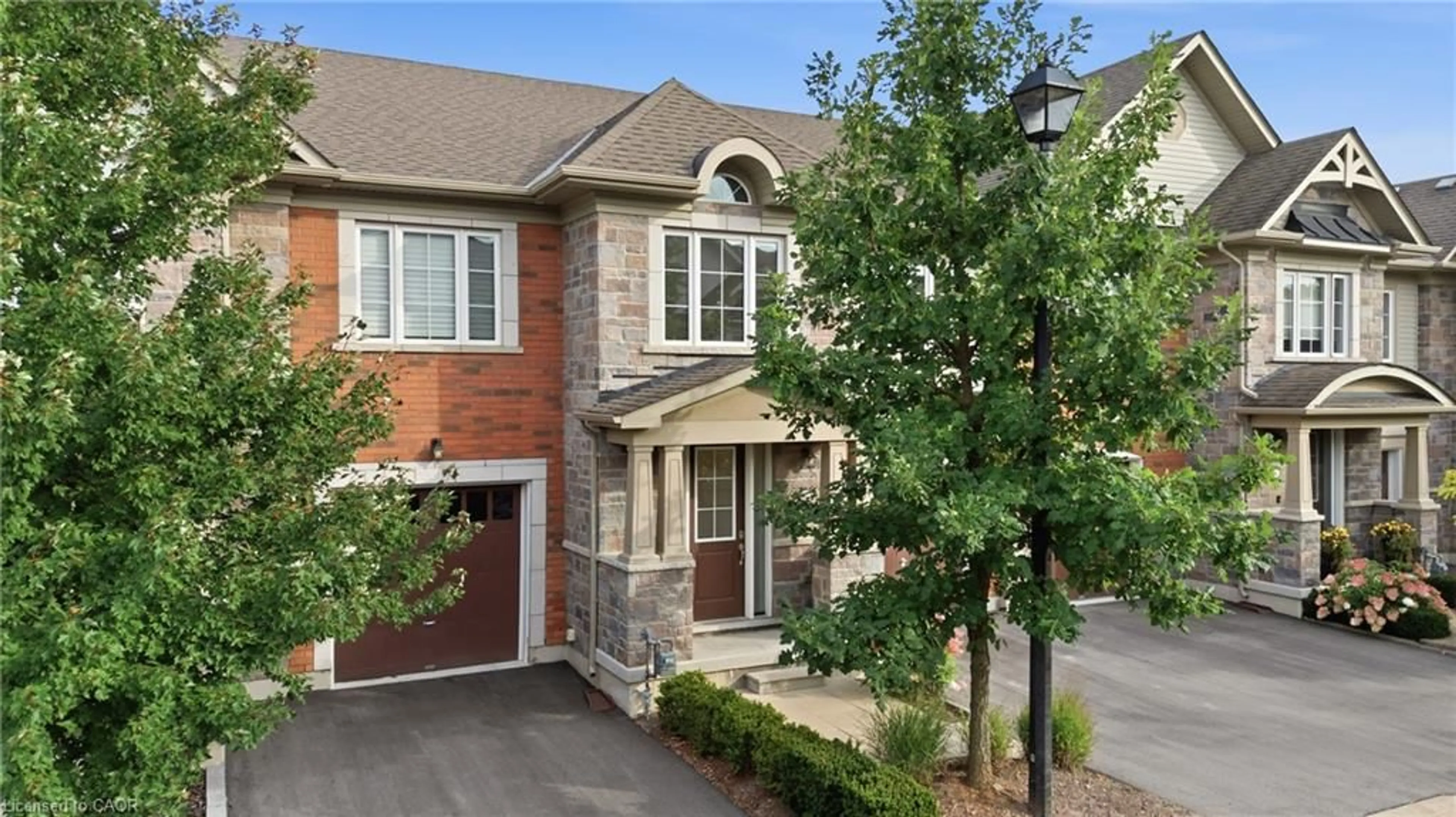 Home with brick exterior material, street for 12 George Manor, Niagara-on-the-Lake Ontario L0S 1J0