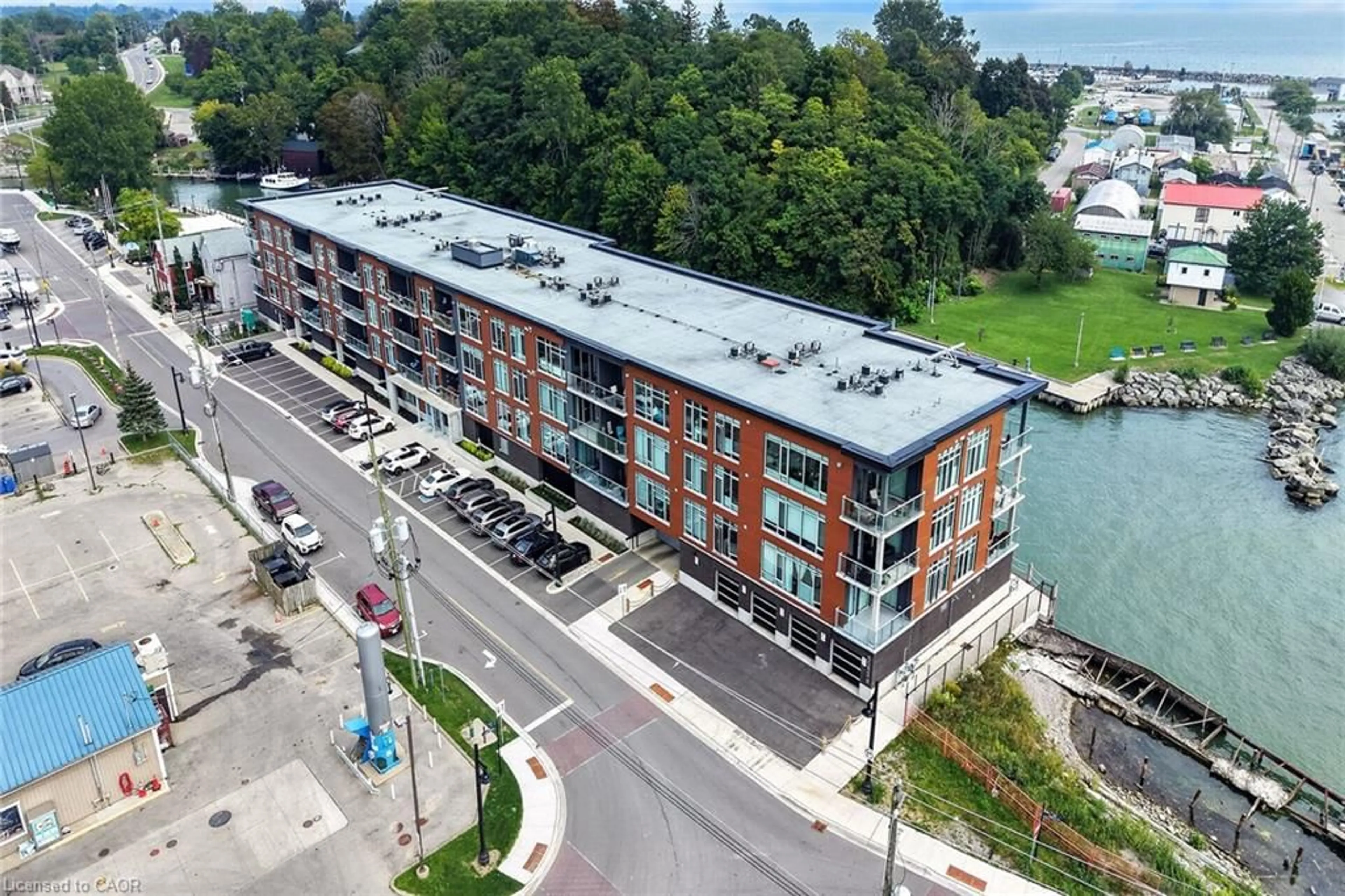 A pic from outside/outdoor area/front of a property/back of a property/a pic from drone, unknown for 38 Harbour St #304, Port Dover Ontario N0A 1N0