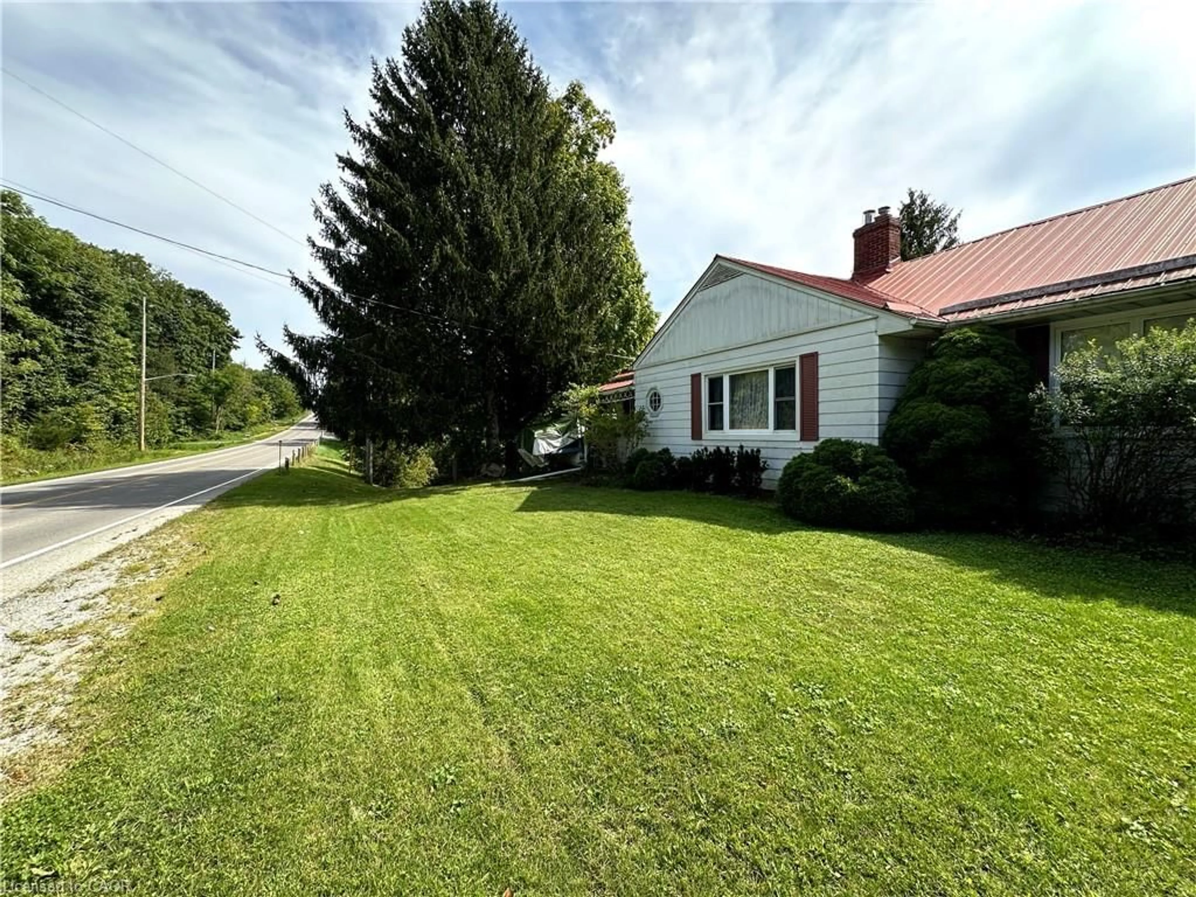 A pic from outside/outdoor area/front of a property/back of a property/a pic from drone, street for 126 Decou Rd, Simcoe Ontario N3Y 4K2