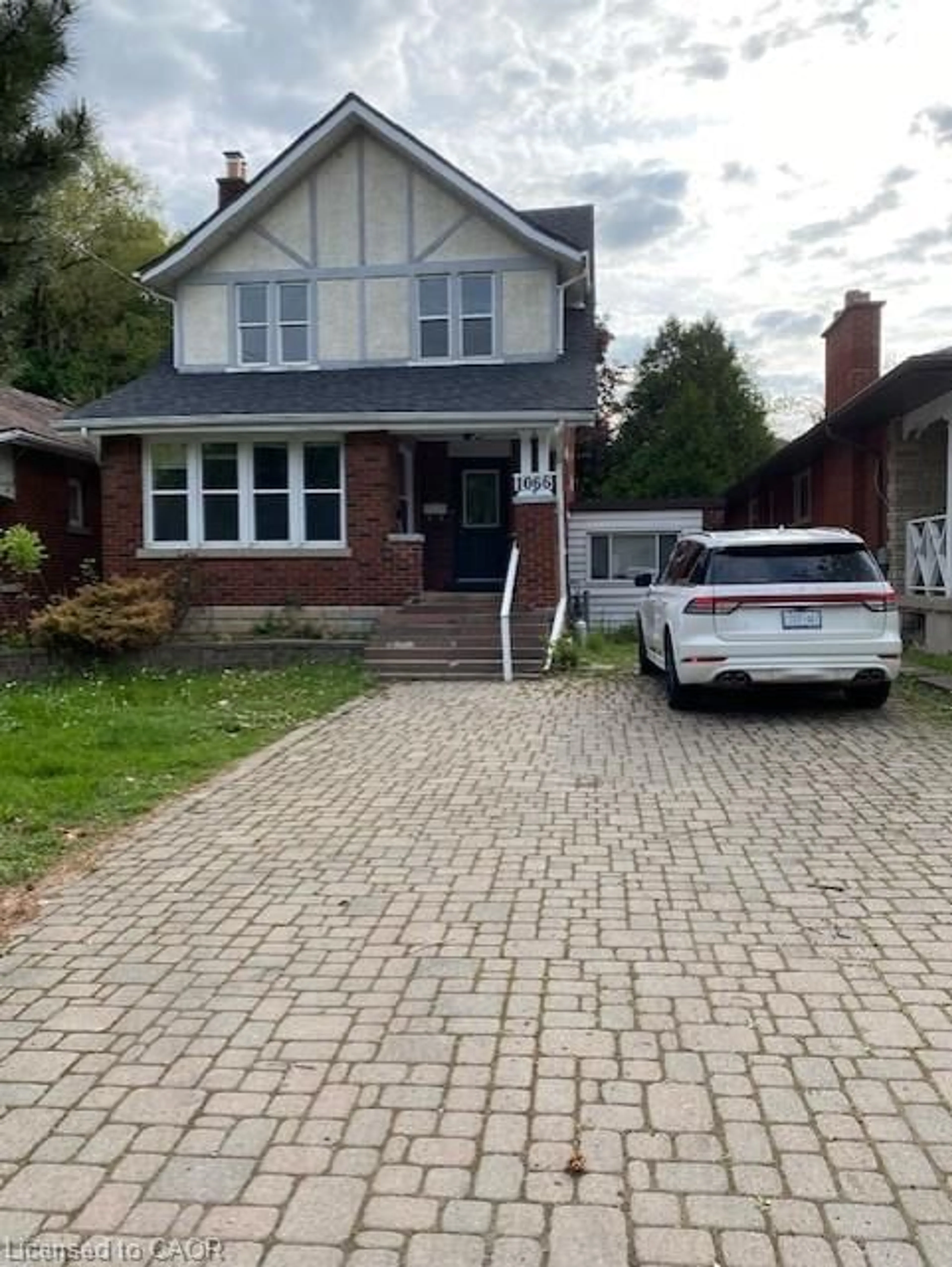 Home with brick exterior material, street for 1066 Richmond St, London Ontario N6A 3J9