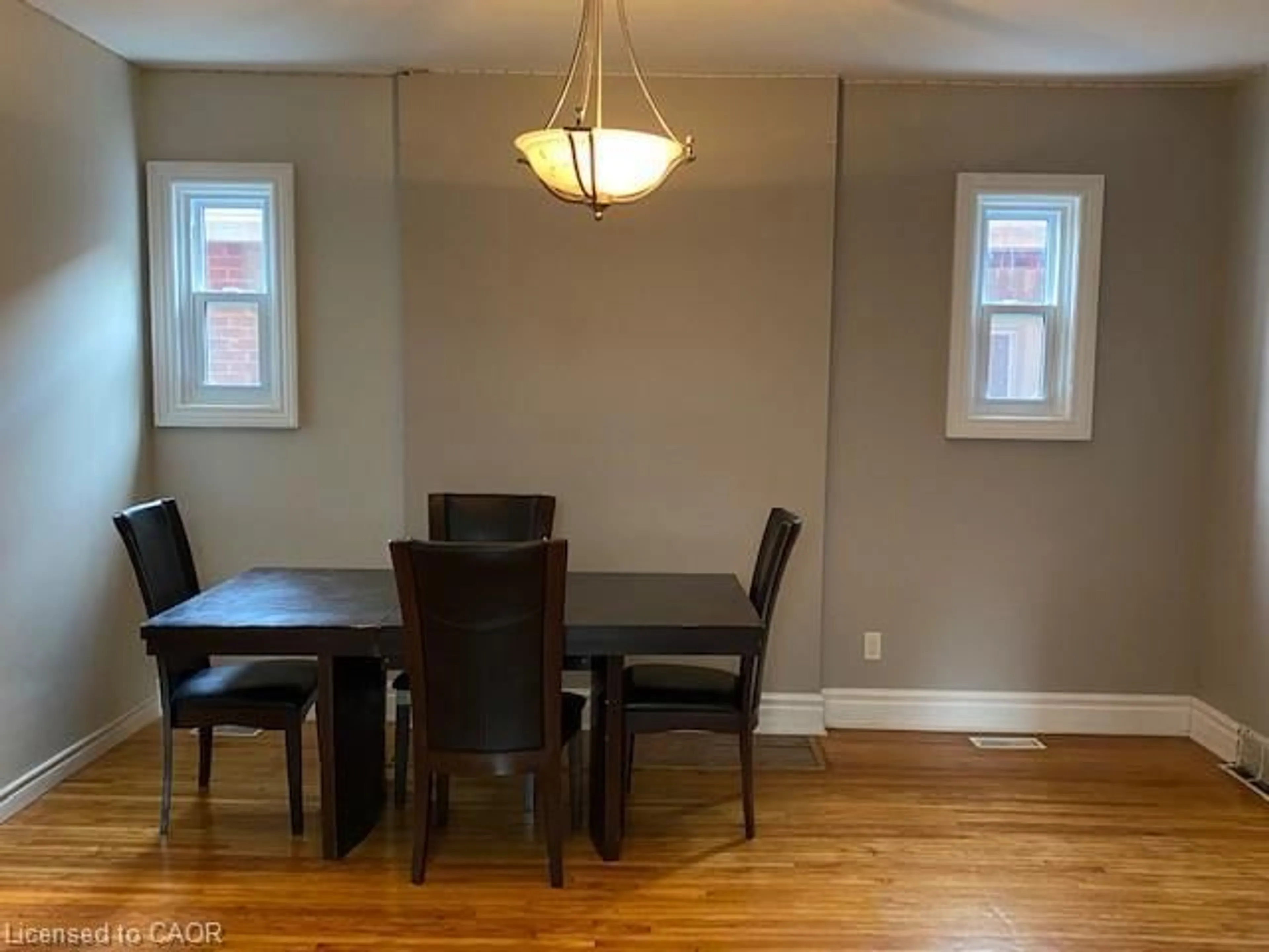 Dining room, wood/laminate floor for 1066 Richmond St, London Ontario N6A 3J9