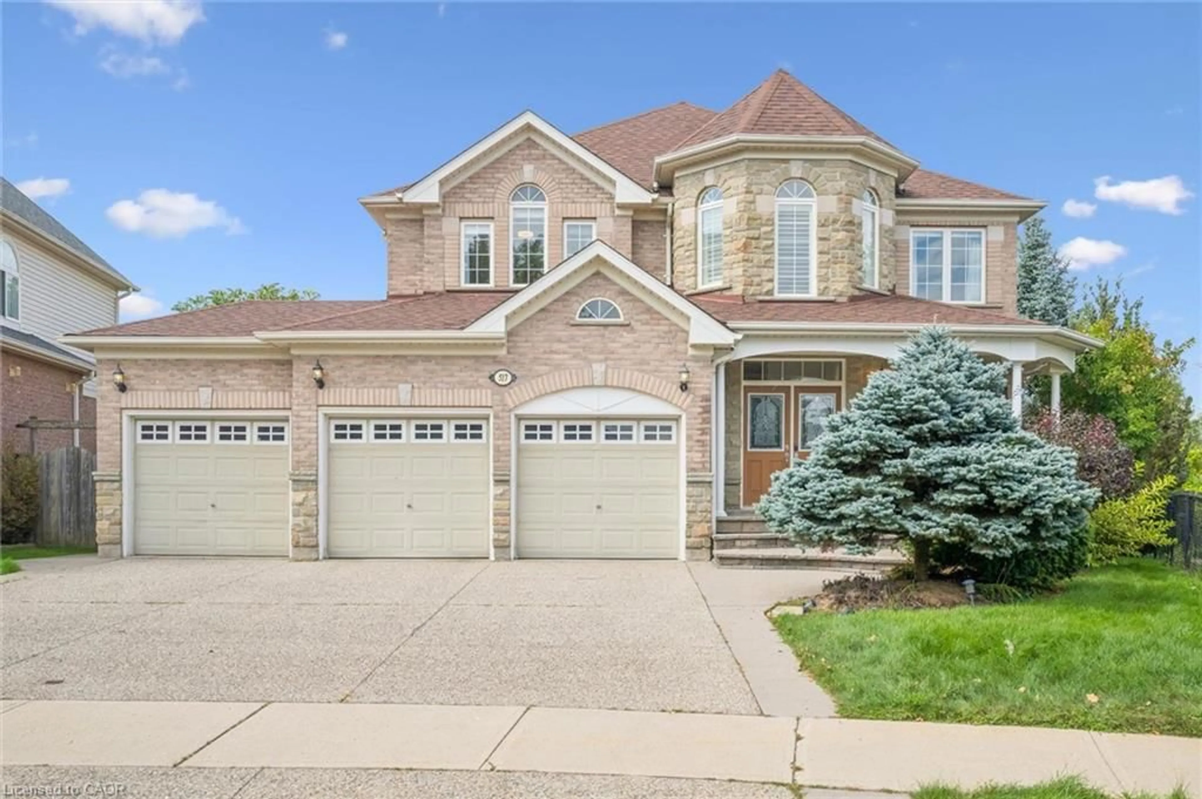 Home with brick exterior material, street for 517 Topper Woods Cres, Kitchener Ontario N2P 2Y4