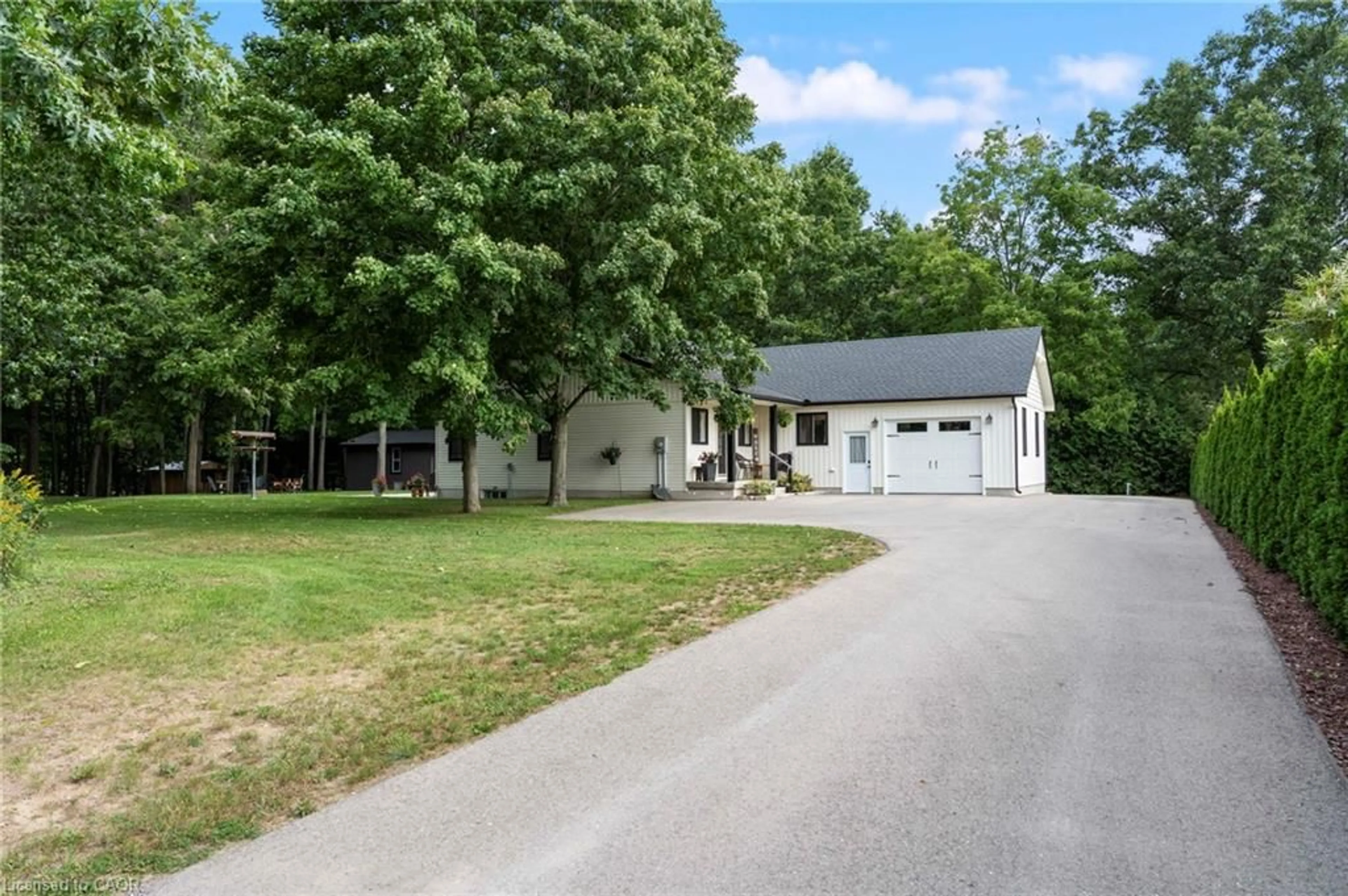 A pic from outside/outdoor area/front of a property/back of a property/a pic from drone, street for 22 Milne St, Walsingham Ontario N0E 1X0