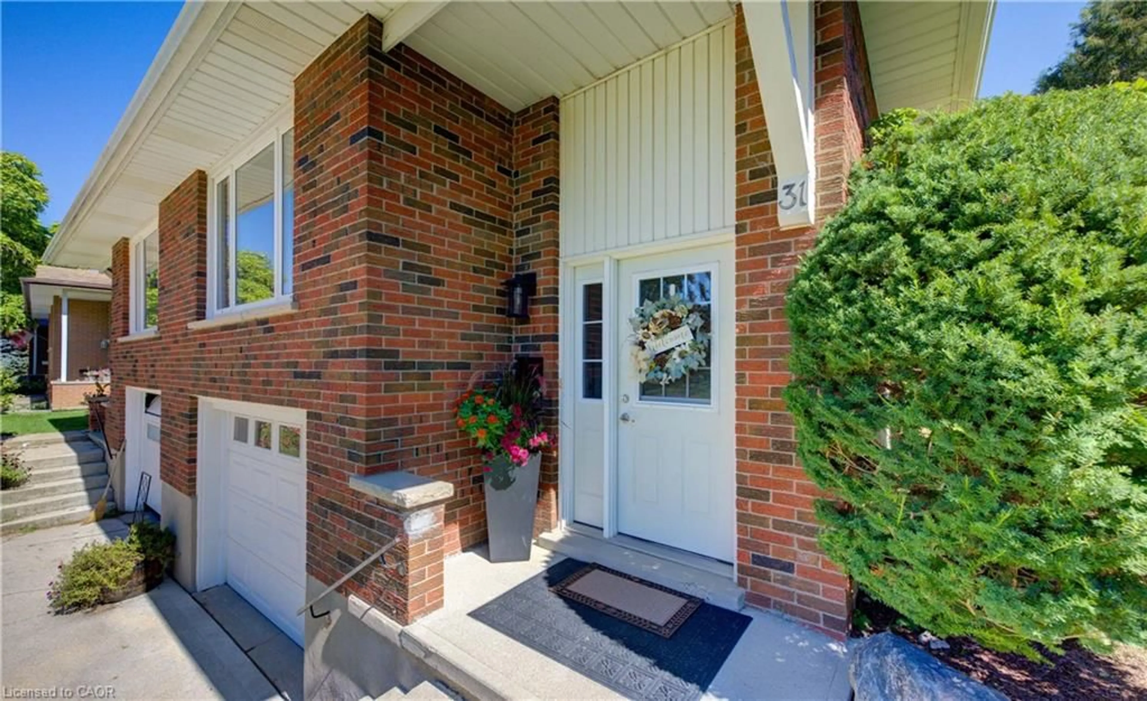Home with brick exterior material, street for 31 Grosbeak Rd, Elmira Ontario N3B 1V8