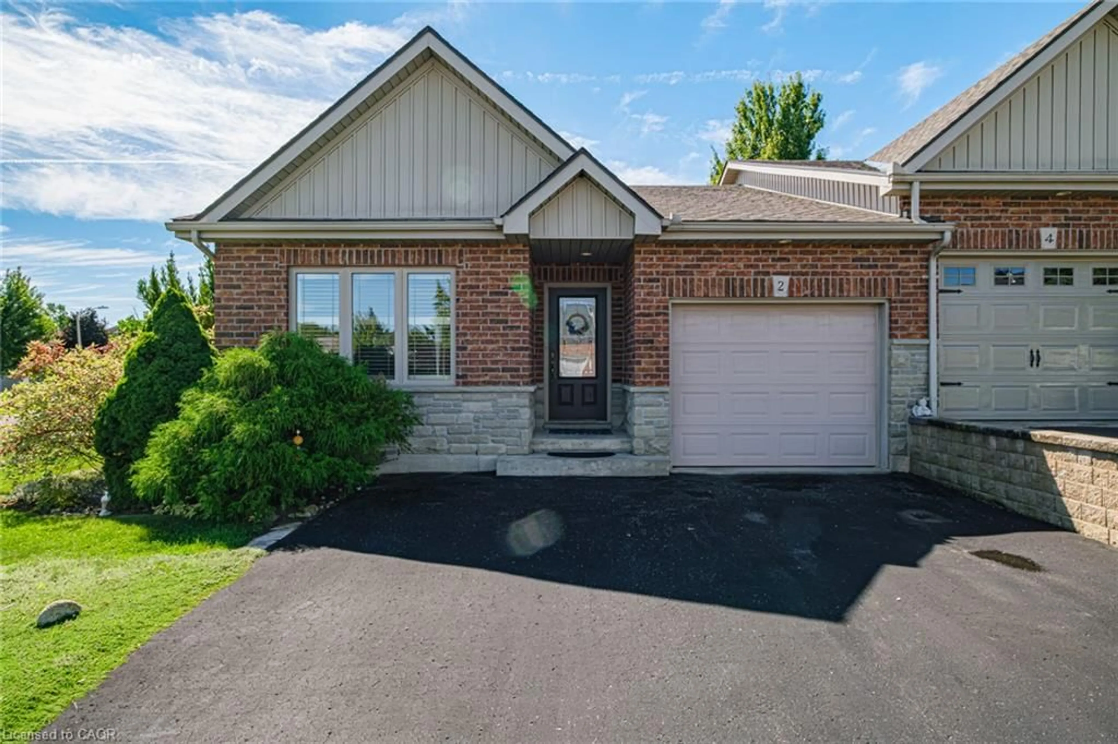 Home with brick exterior material, street for 2 Millcroft Dr, Simcoe Ontario N3Y 5M9