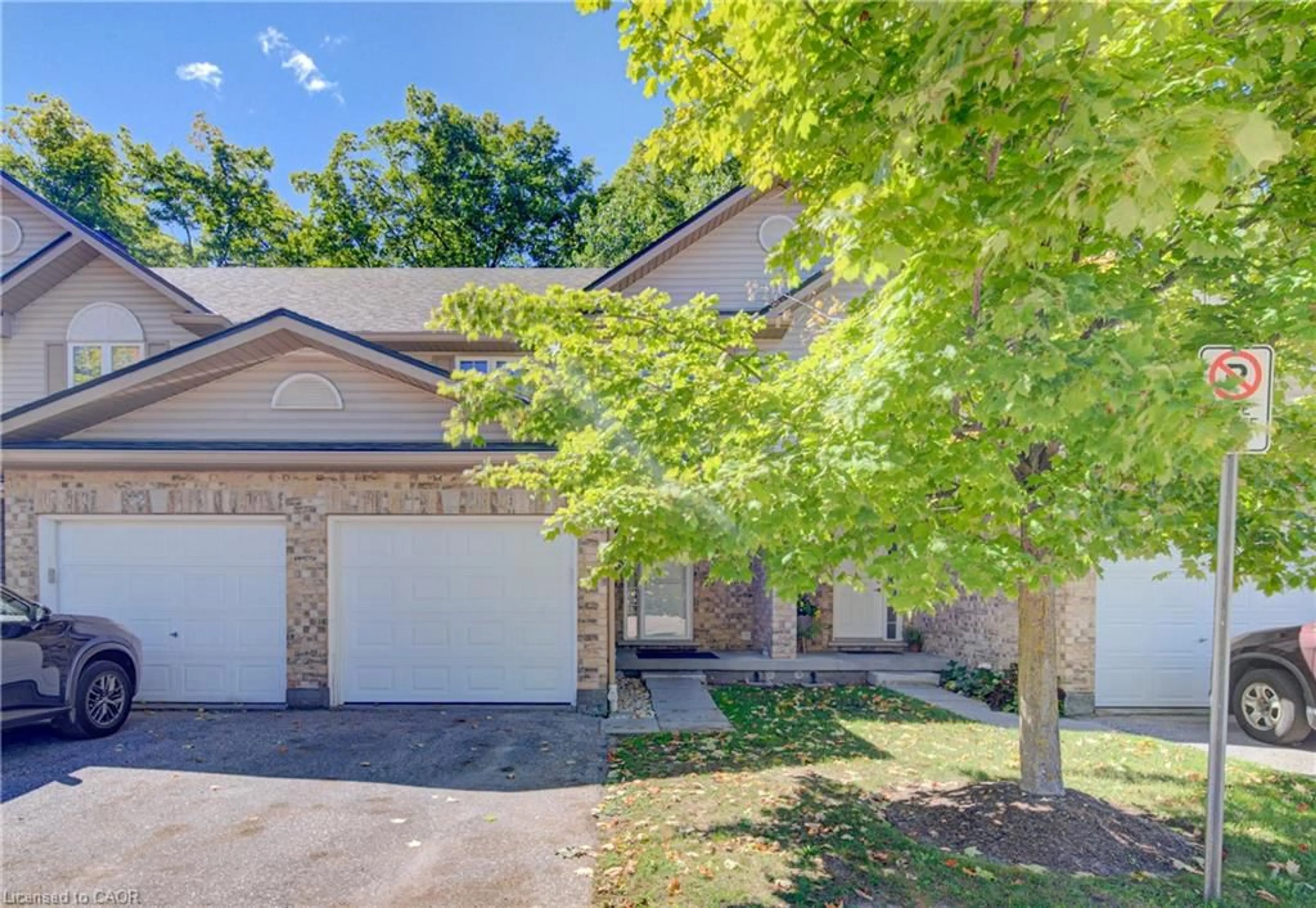 A pic from outside/outdoor area/front of a property/back of a property/a pic from drone, street for 300 Fallowfield Dr #21, Kitchener Ontario N2C 0A9