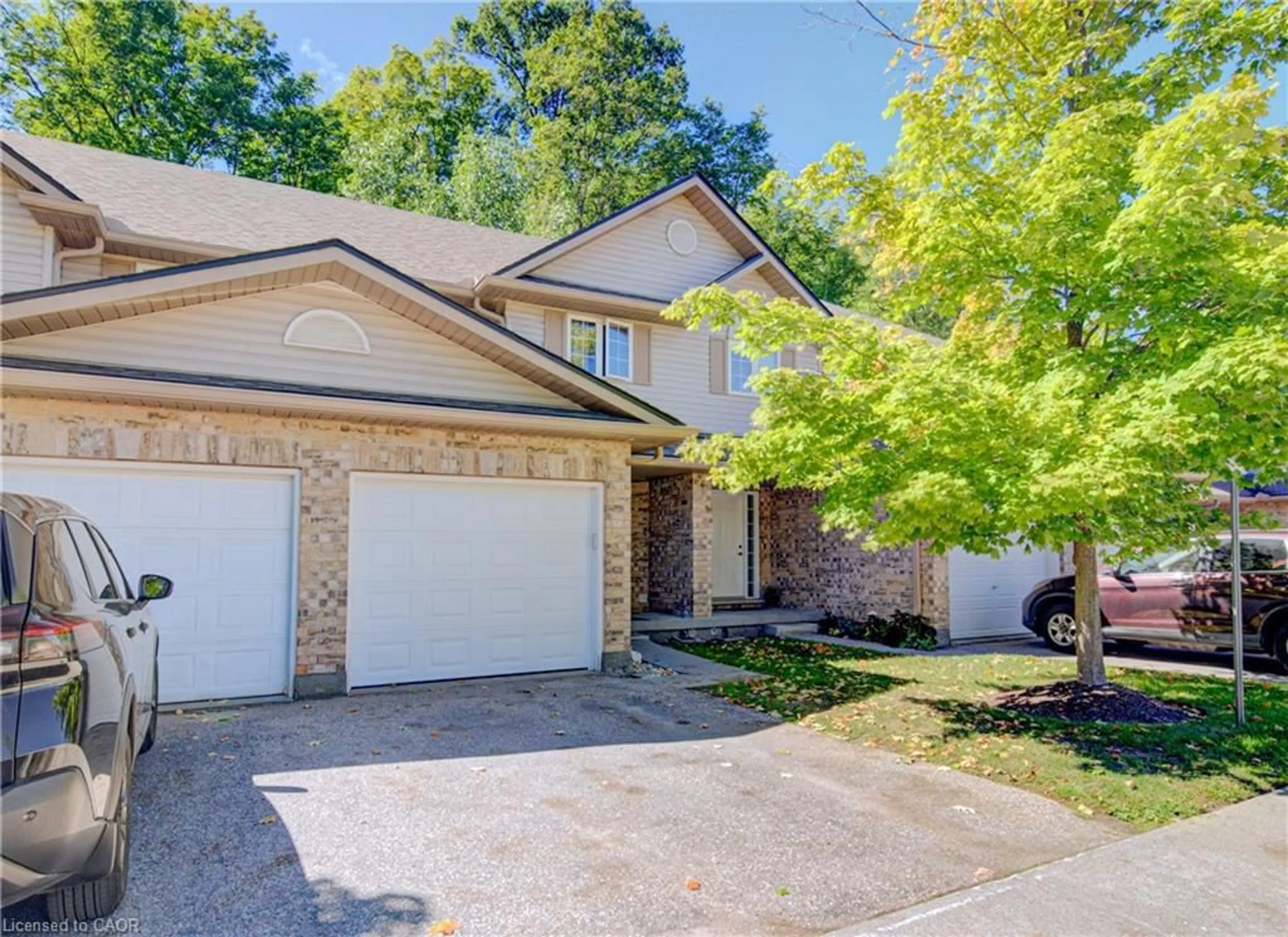 Home with brick exterior material, street for 300 Fallowfield Dr #21, Kitchener Ontario N2C 0A9