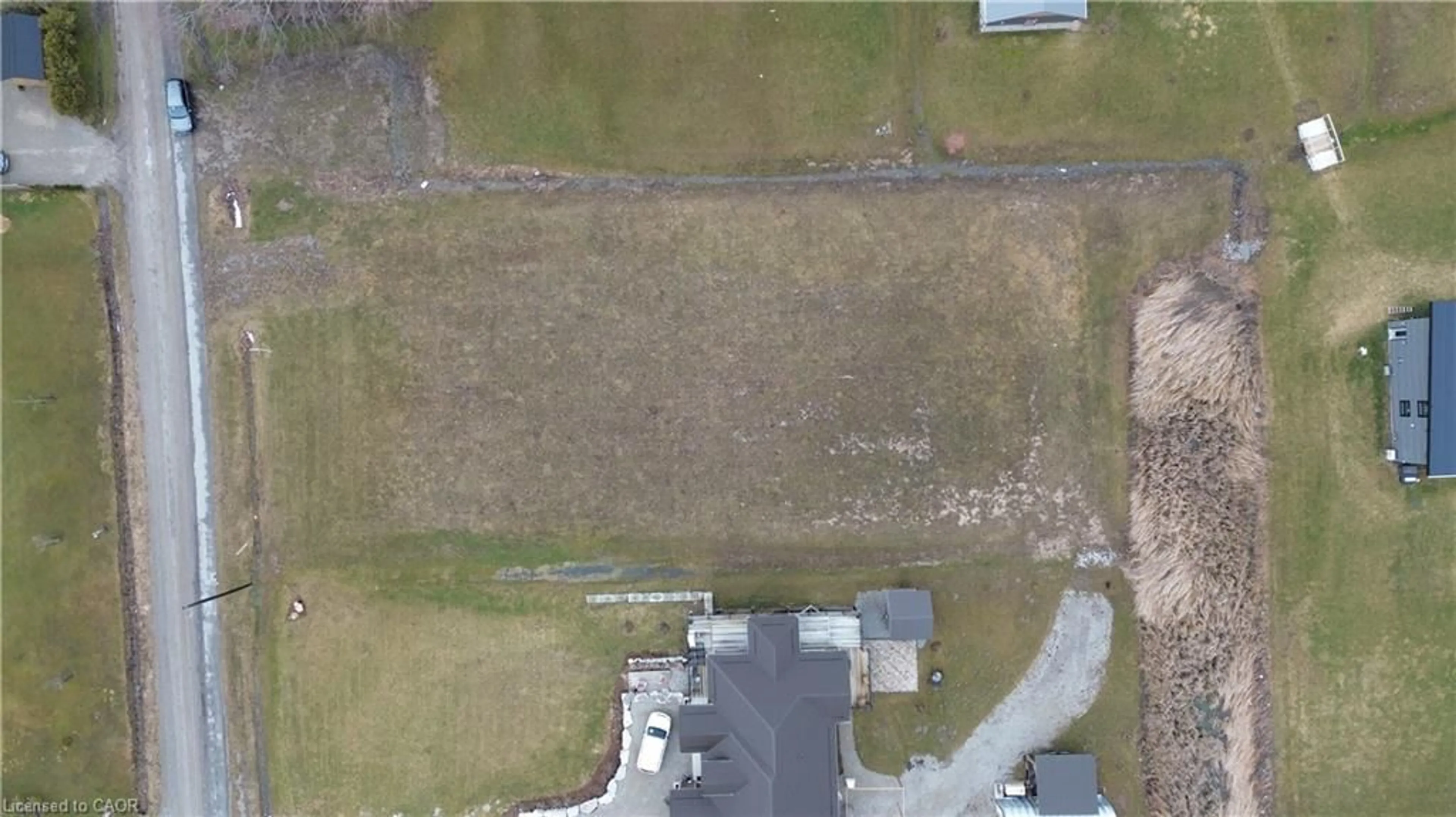 A pic from outside/outdoor area/front of a property/back of a property/a pic from drone, street for 20 Warnick Rd, Lowbanks Ontario N0A 1K0