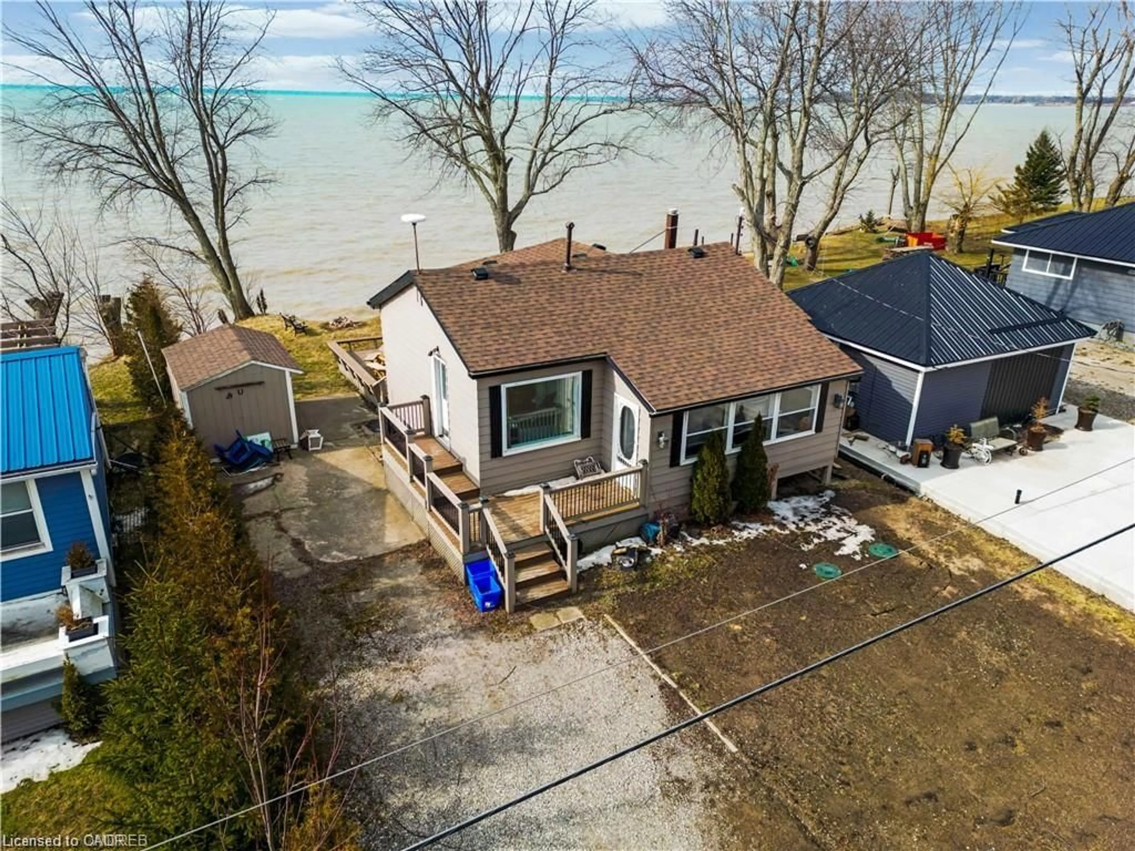 A pic from outside/outdoor area/front of a property/back of a property/a pic from drone, water/lake/river/ocean view for 27 Villella Rd, Lowbanks Ontario N0A 1K0