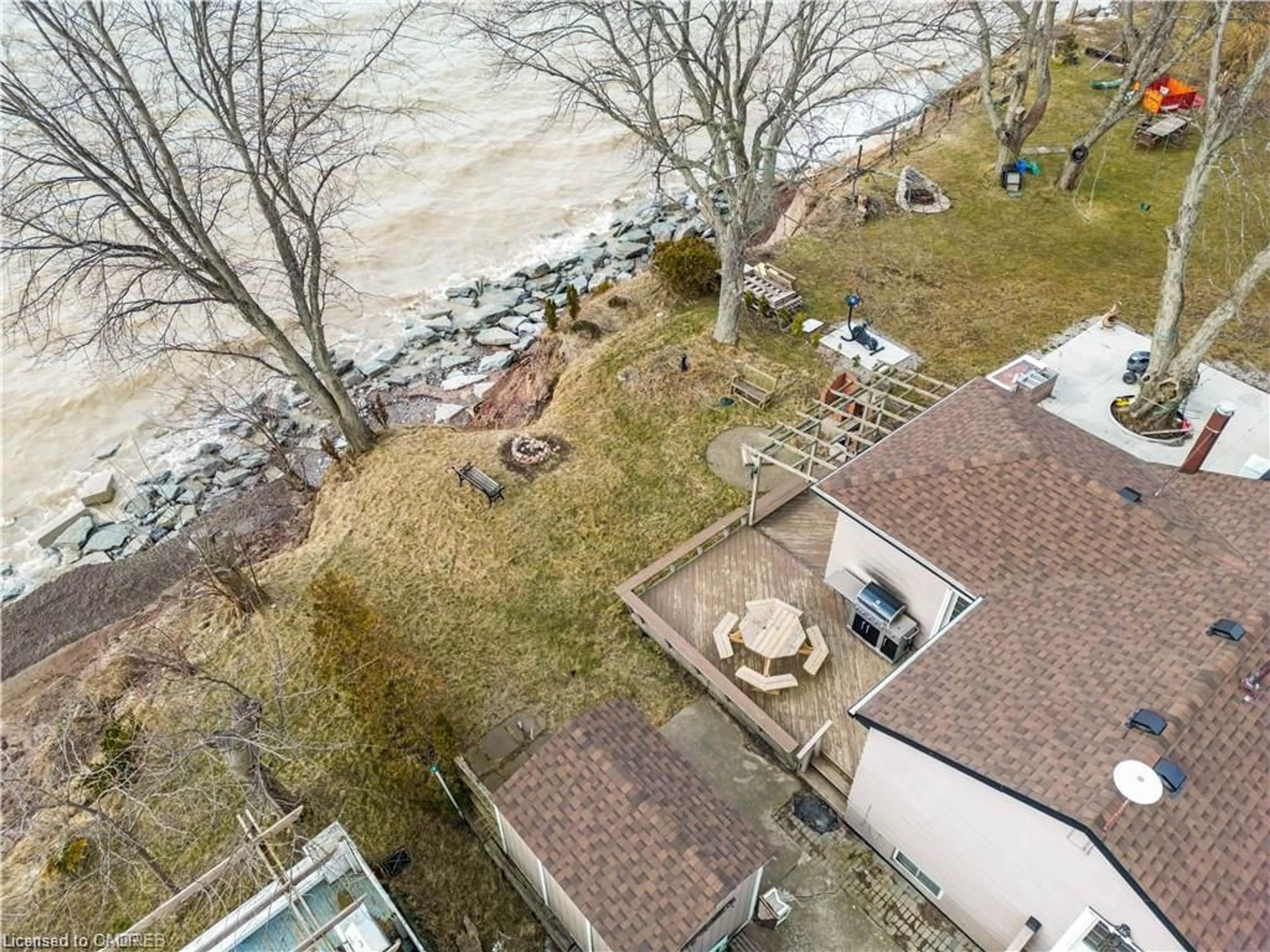 A pic from outside/outdoor area/front of a property/back of a property/a pic from drone, water/lake/river/ocean view for 27 Villella Rd, Lowbanks Ontario N0A 1K0