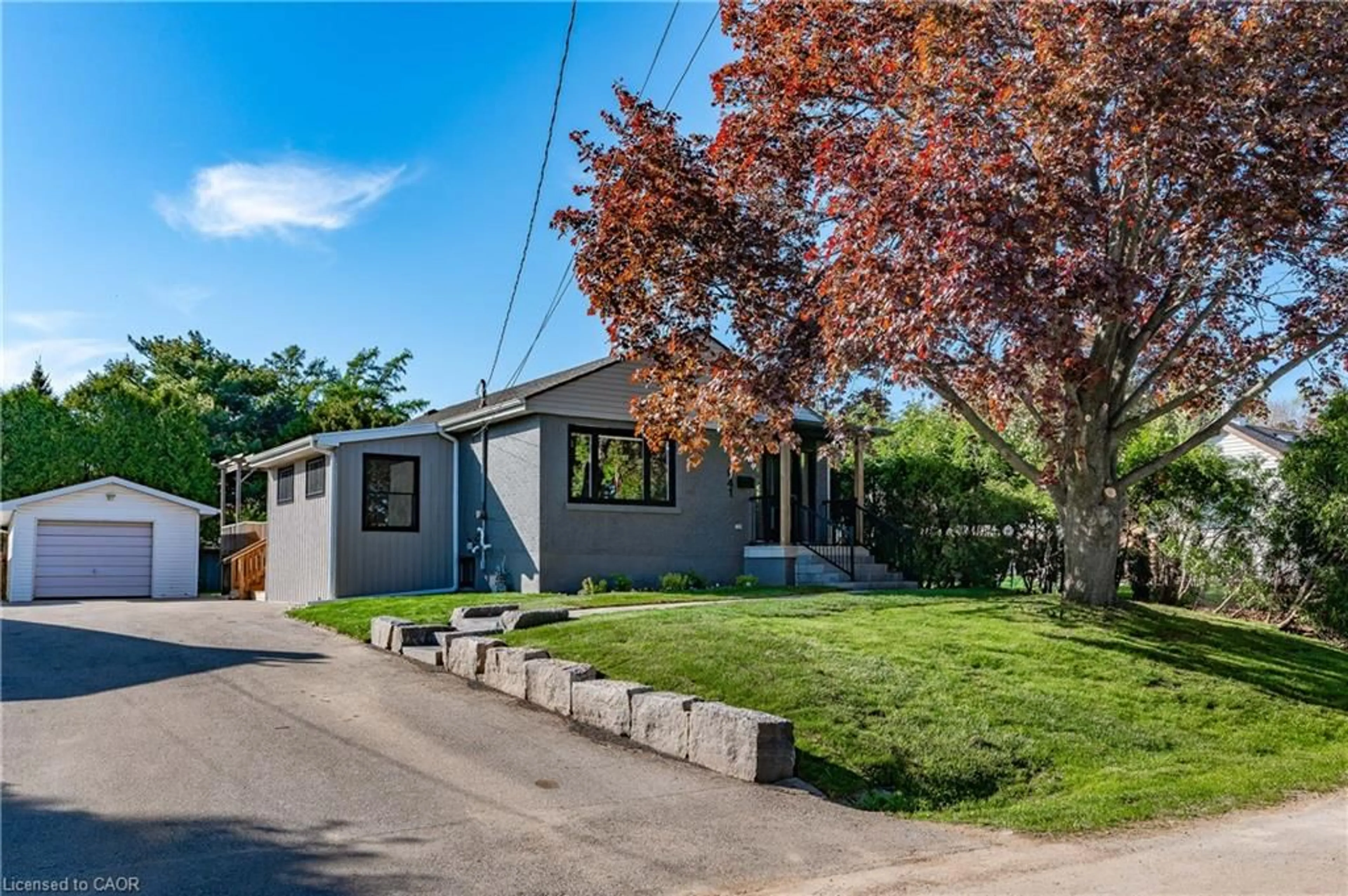 Home with vinyl exterior material, street for 1041 Shepherd's Dr, Burlington Ontario L7T 3R4