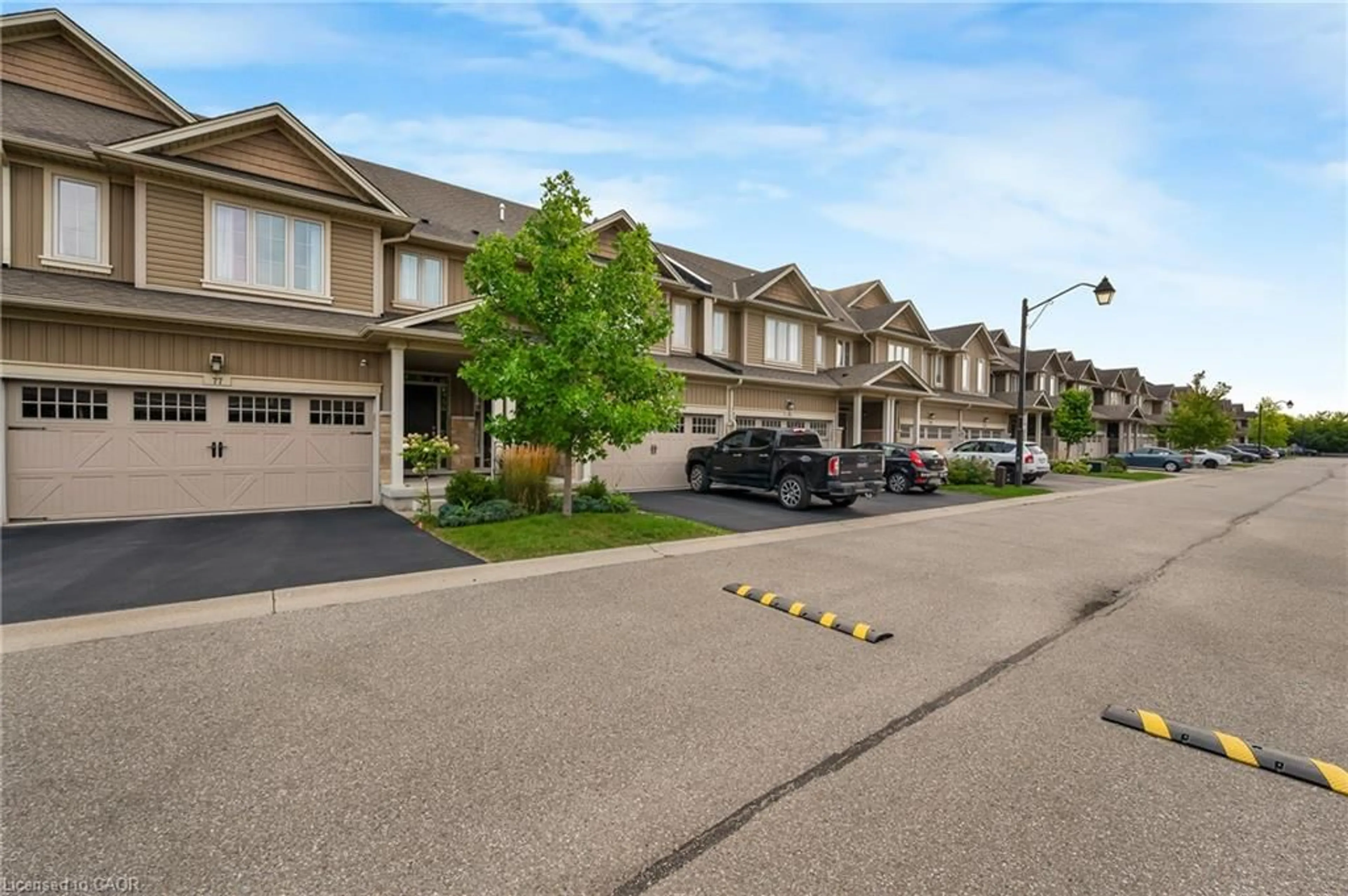 A pic from outside/outdoor area/front of a property/back of a property/a pic from drone, street for 80 Willow St #77, Paris Ontario N3L 2K6