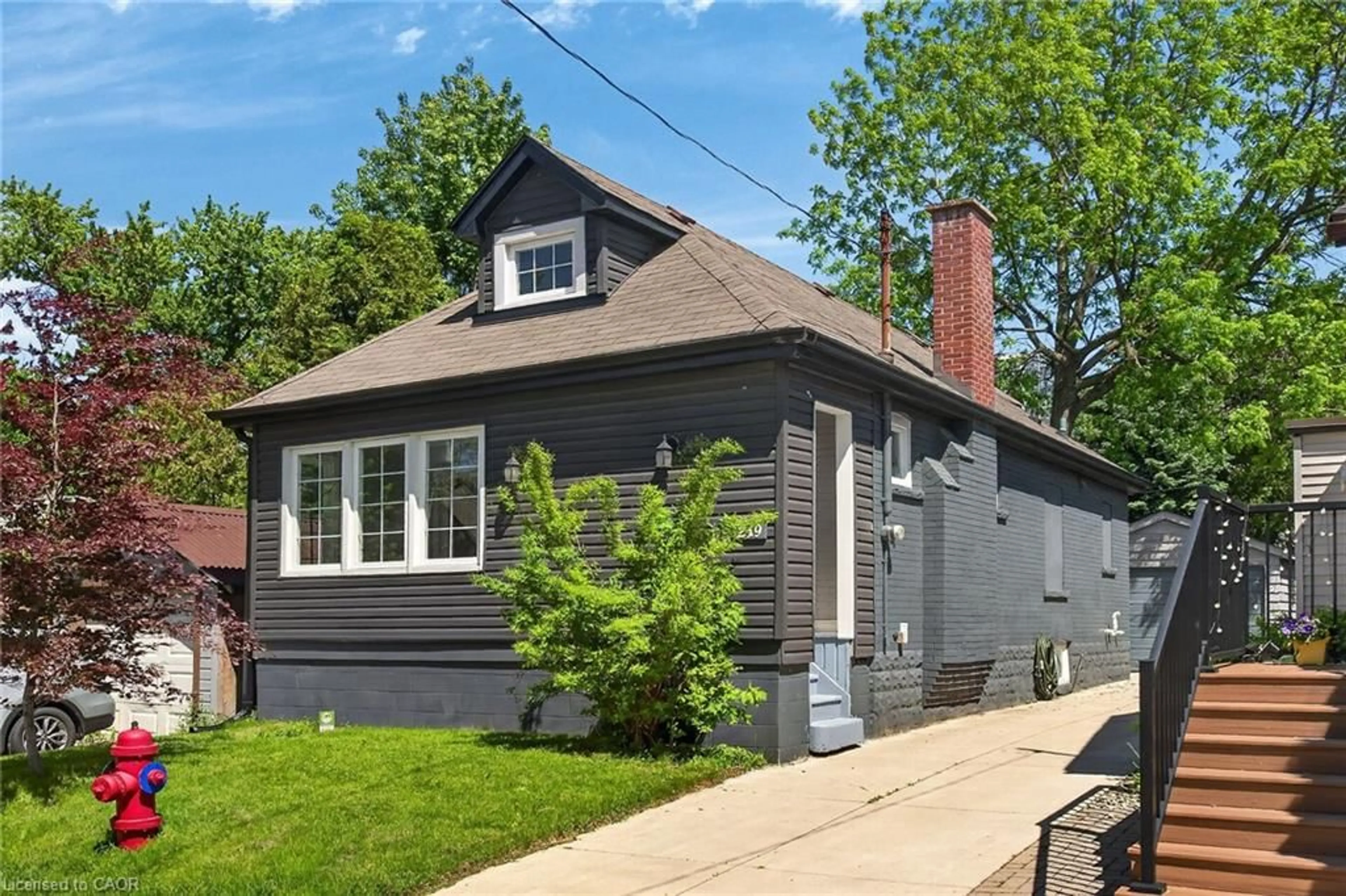 Home with brick exterior material, street for 219 Hess St, Hamilton Ontario L8P 3P3