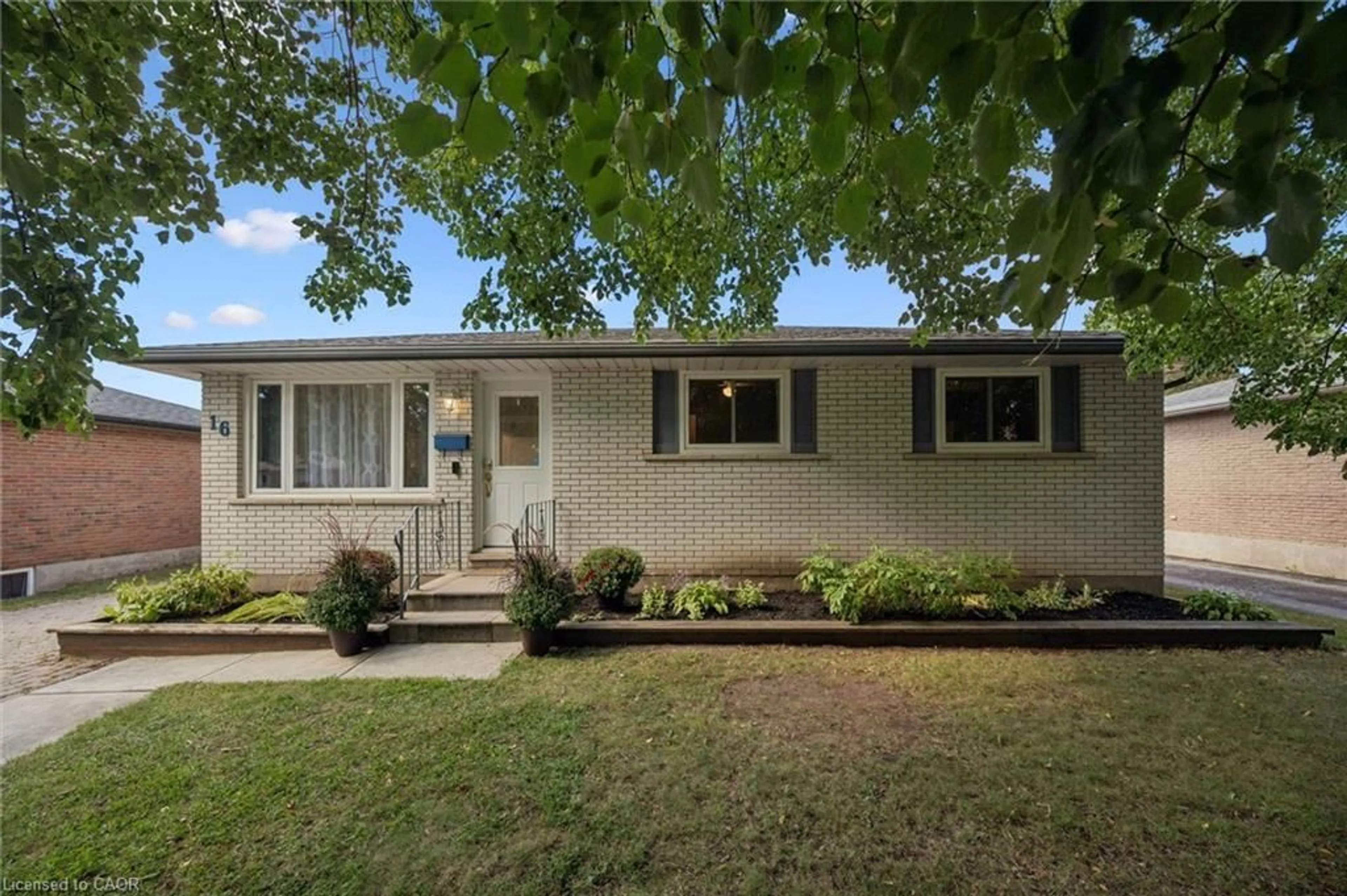 Home with vinyl exterior material, street for 16 Argyle Dr, Guelph Ontario N1G 2P2