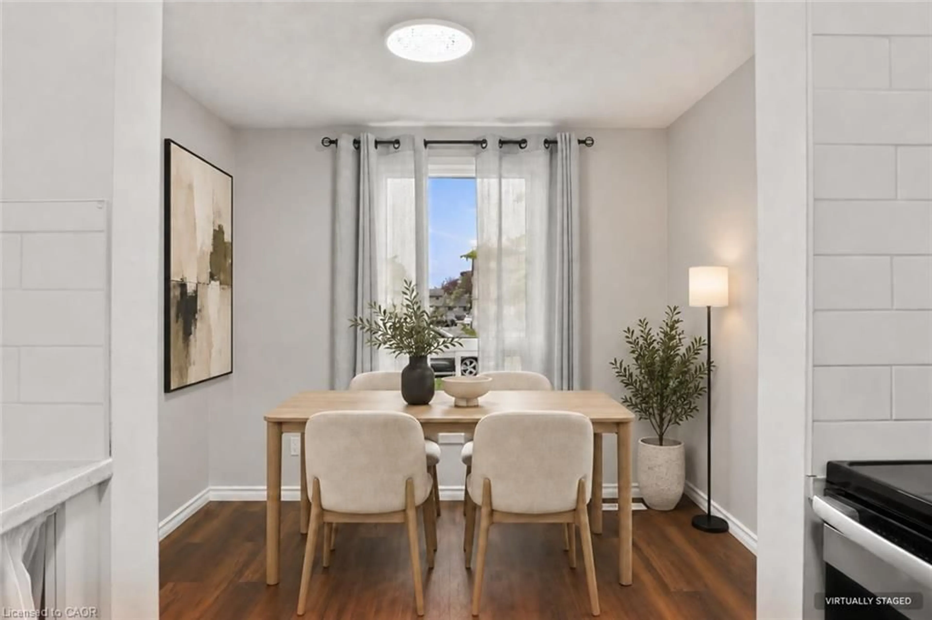 Dining room, wood/laminate floor for 700 Paisley Rd #56, Guelph Ontario N1K 1A3