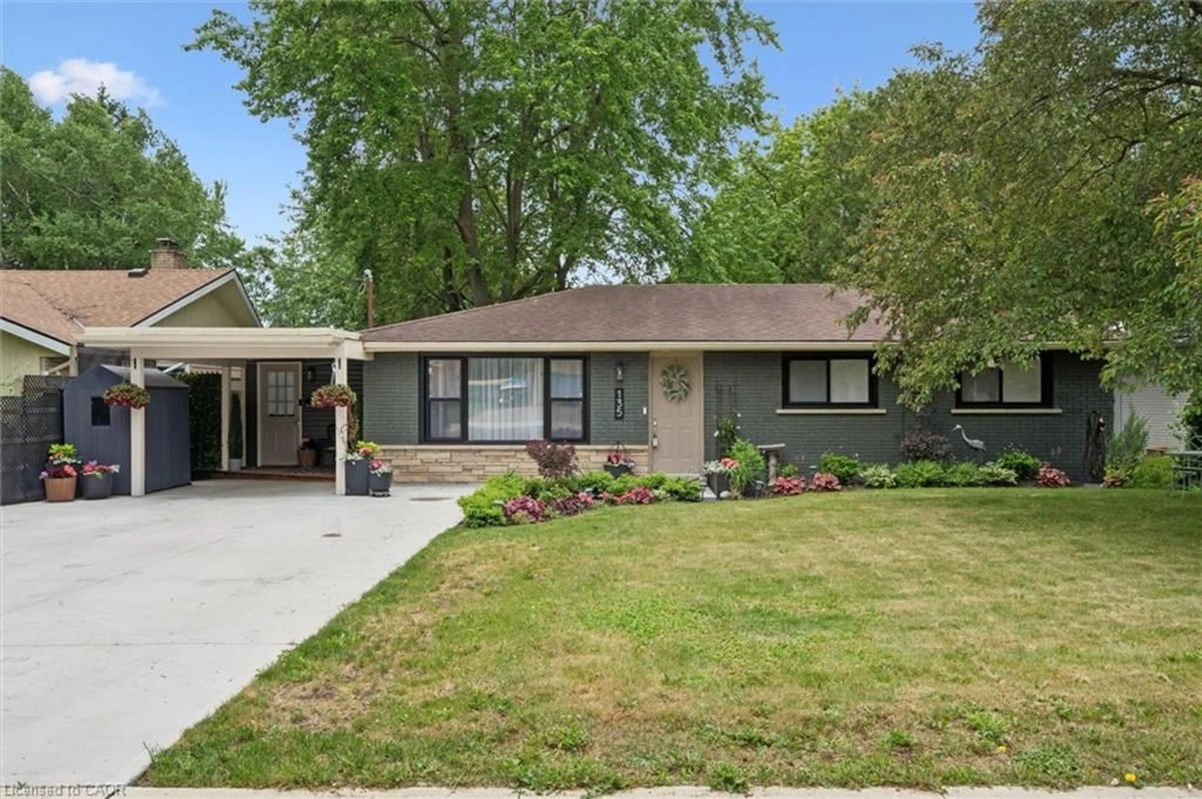 Home with brick exterior material, street for 135 Bridge St, Waterloo Ontario N2K 1K8