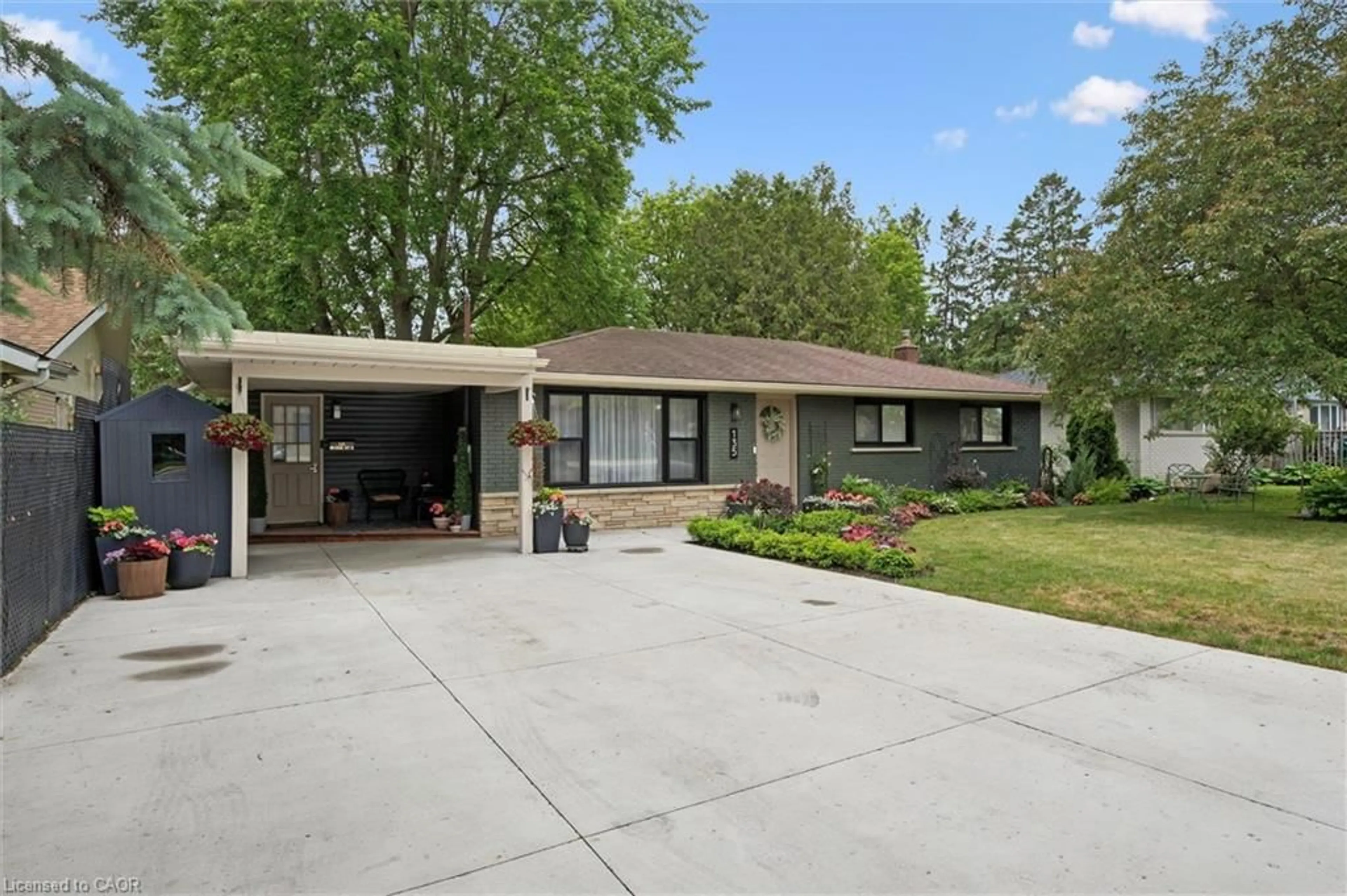 Home with vinyl exterior material, street for 135 Bridge St, Waterloo Ontario N2K 1K8