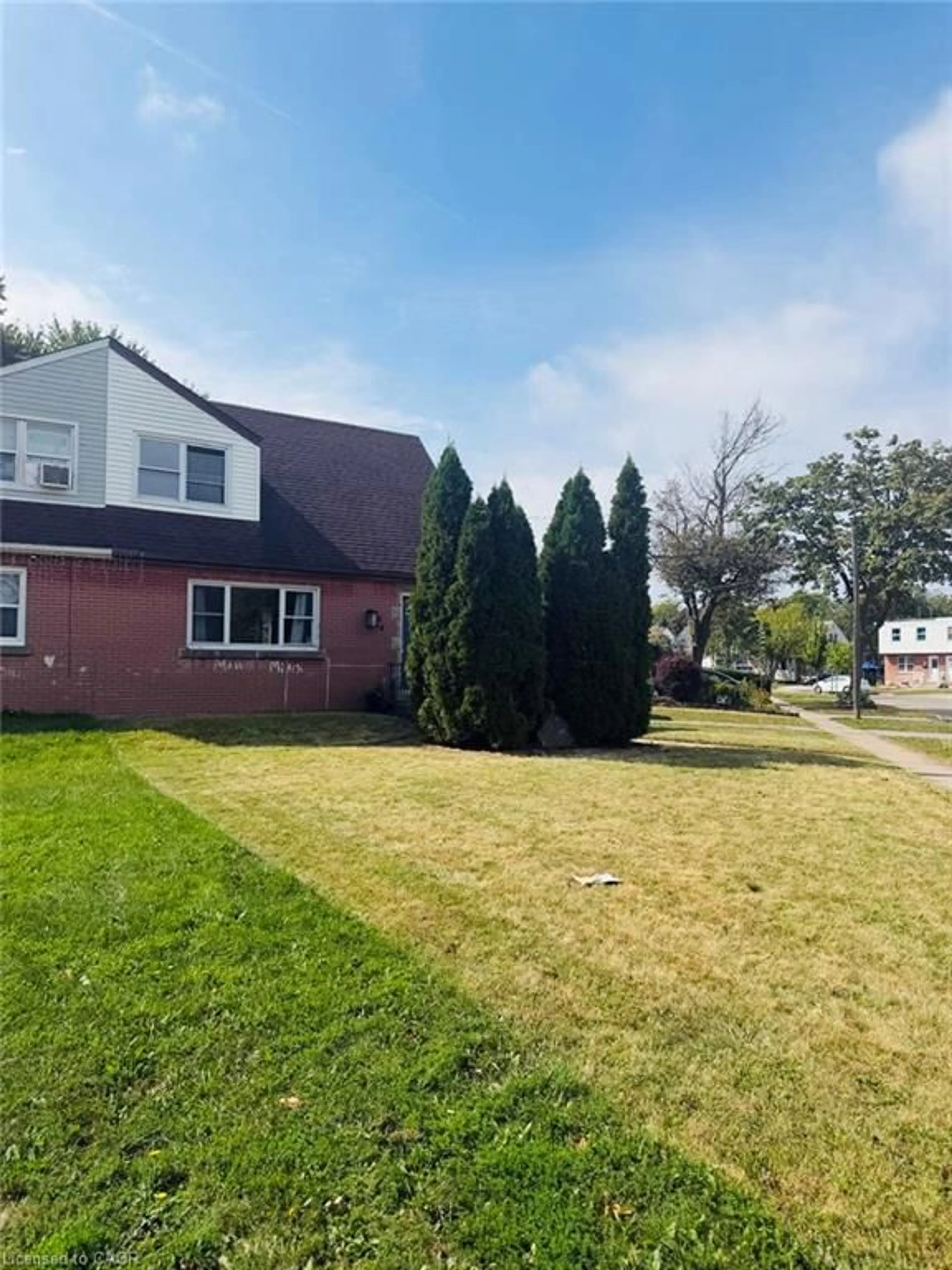 A pic from outside/outdoor area/front of a property/back of a property/a pic from drone, street for 64 Eastvale Pl #1, Hamilton Ontario L8H 1P1