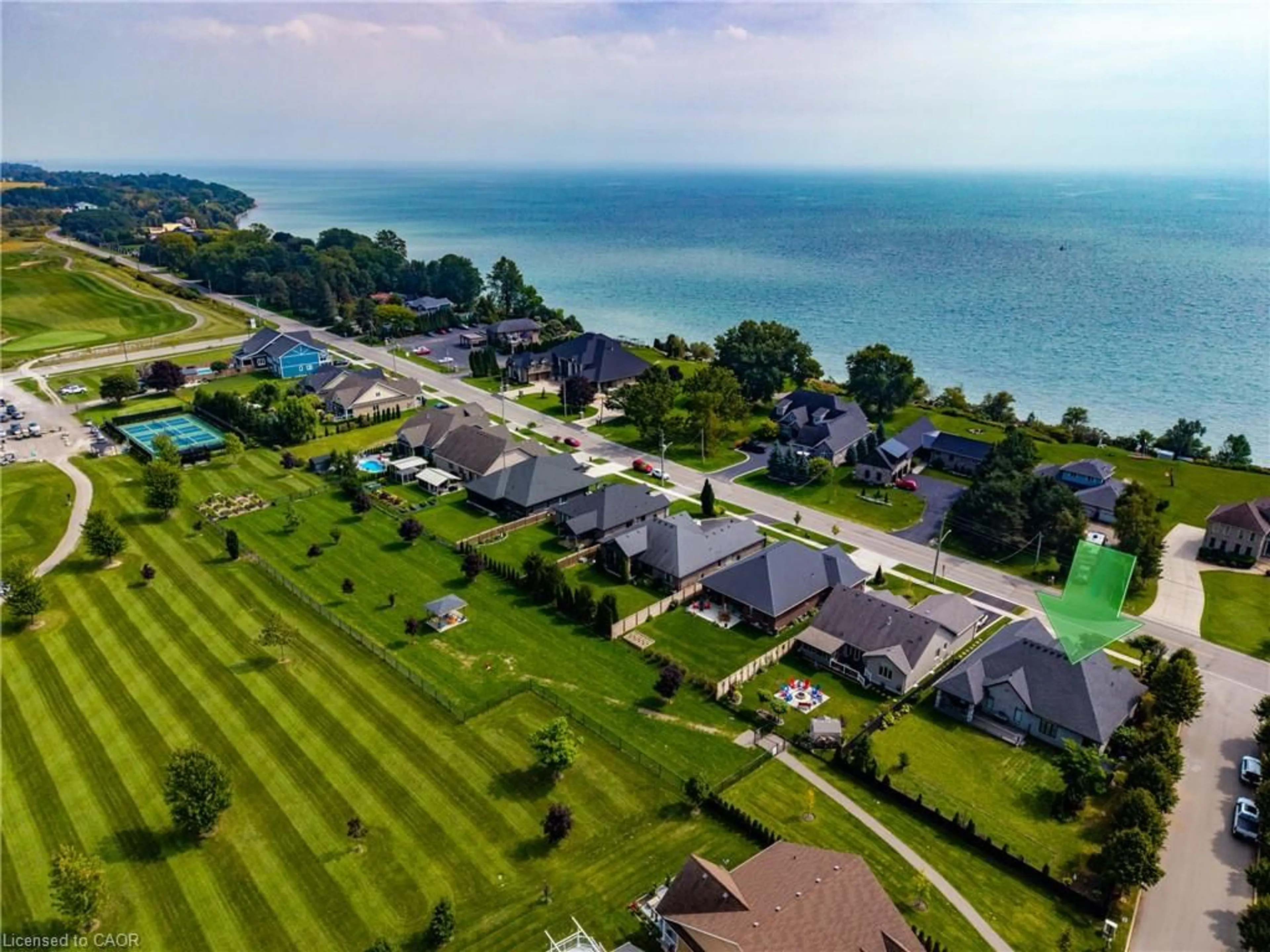A pic from outside/outdoor area/front of a property/back of a property/a pic from drone, water/lake/river/ocean view for 149 New Lakeshore Rd, Port Dover Ontario N0A 1N3