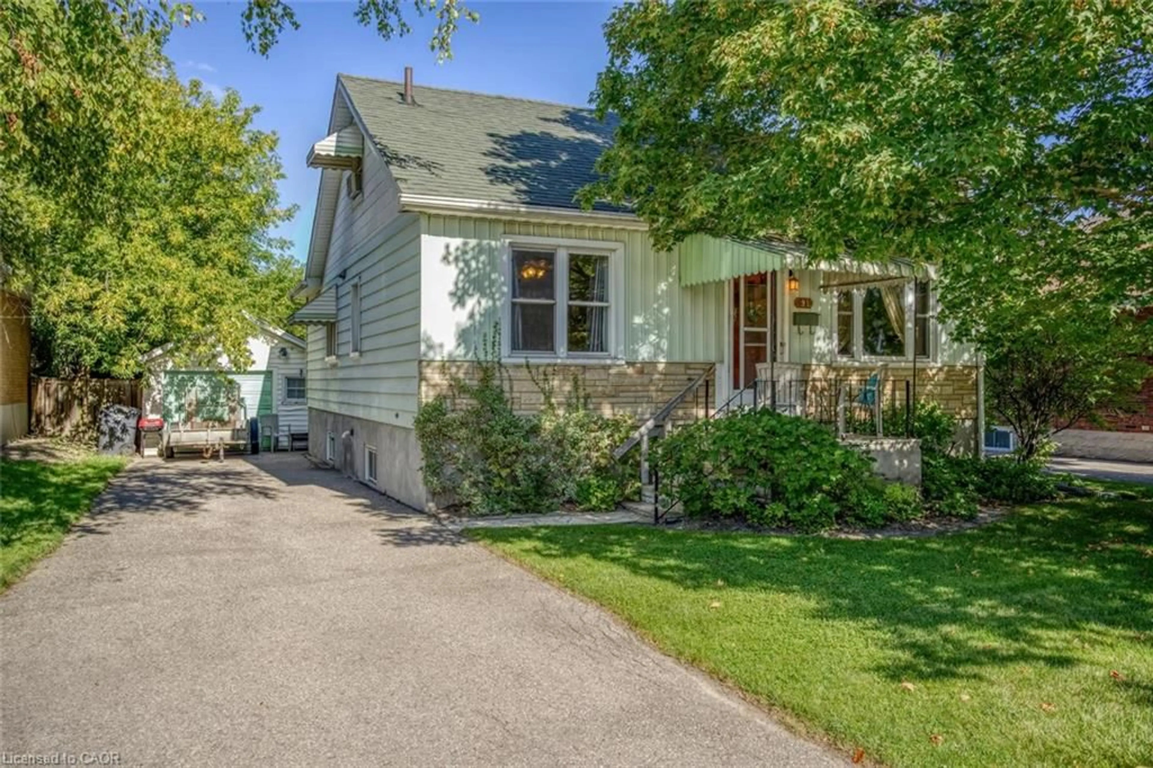 Home with vinyl exterior material, street for 91 Merion St, Guelph Ontario N1H 2M1