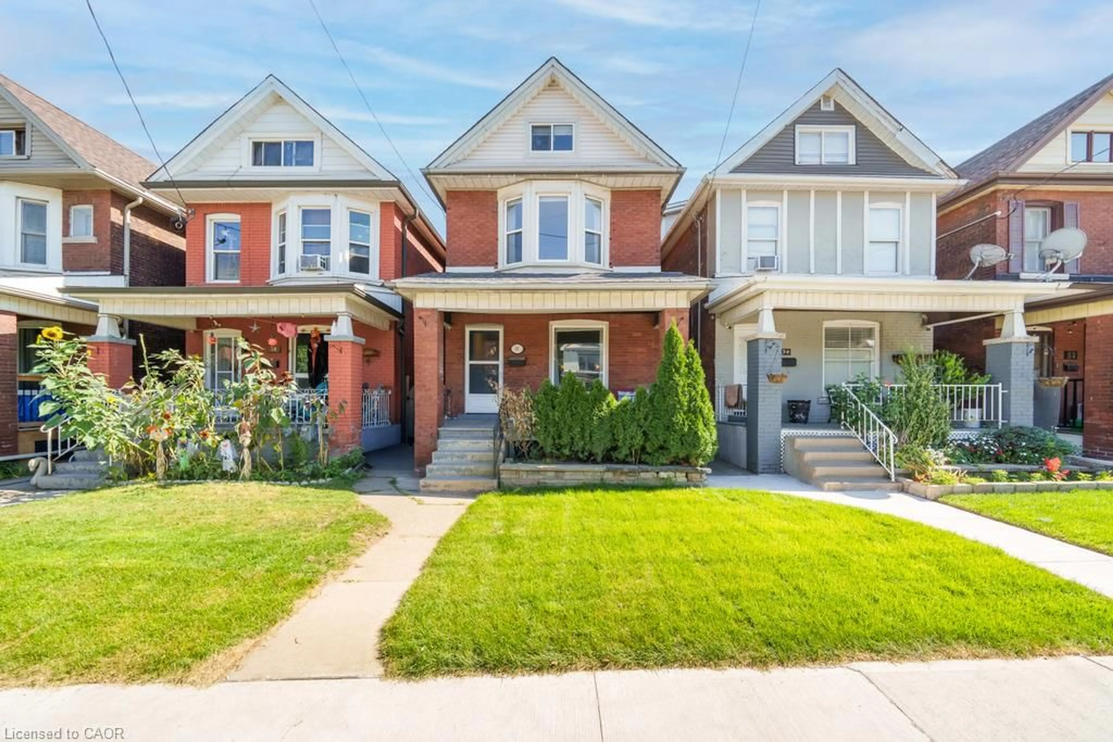 Home with brick exterior material, street for 36 Sherman Ave, Hamilton Ontario L8L 6L8