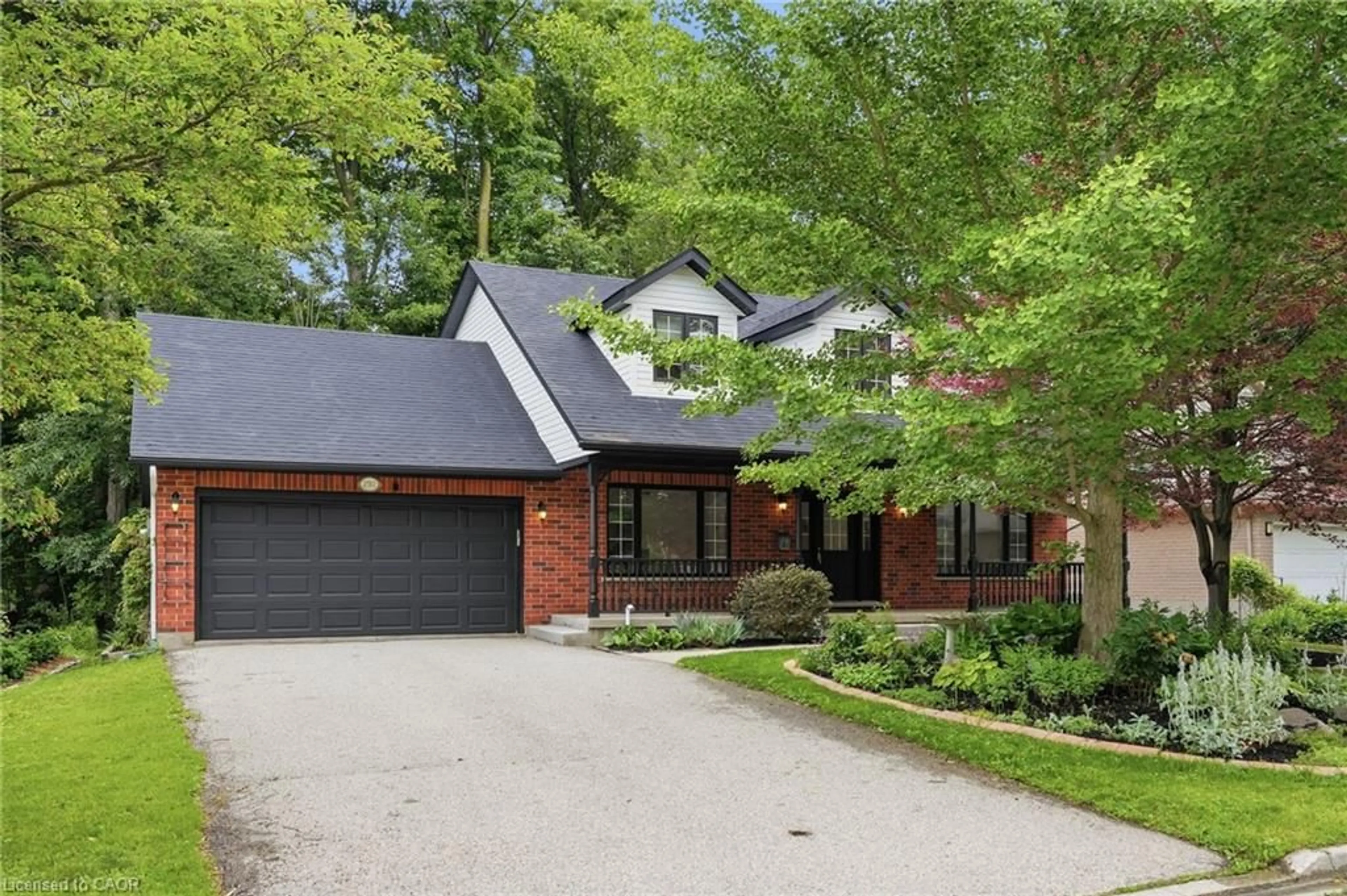 Home with brick exterior material, street for 292 Thorncrest Dr, Waterloo Ontario N2L 5R5