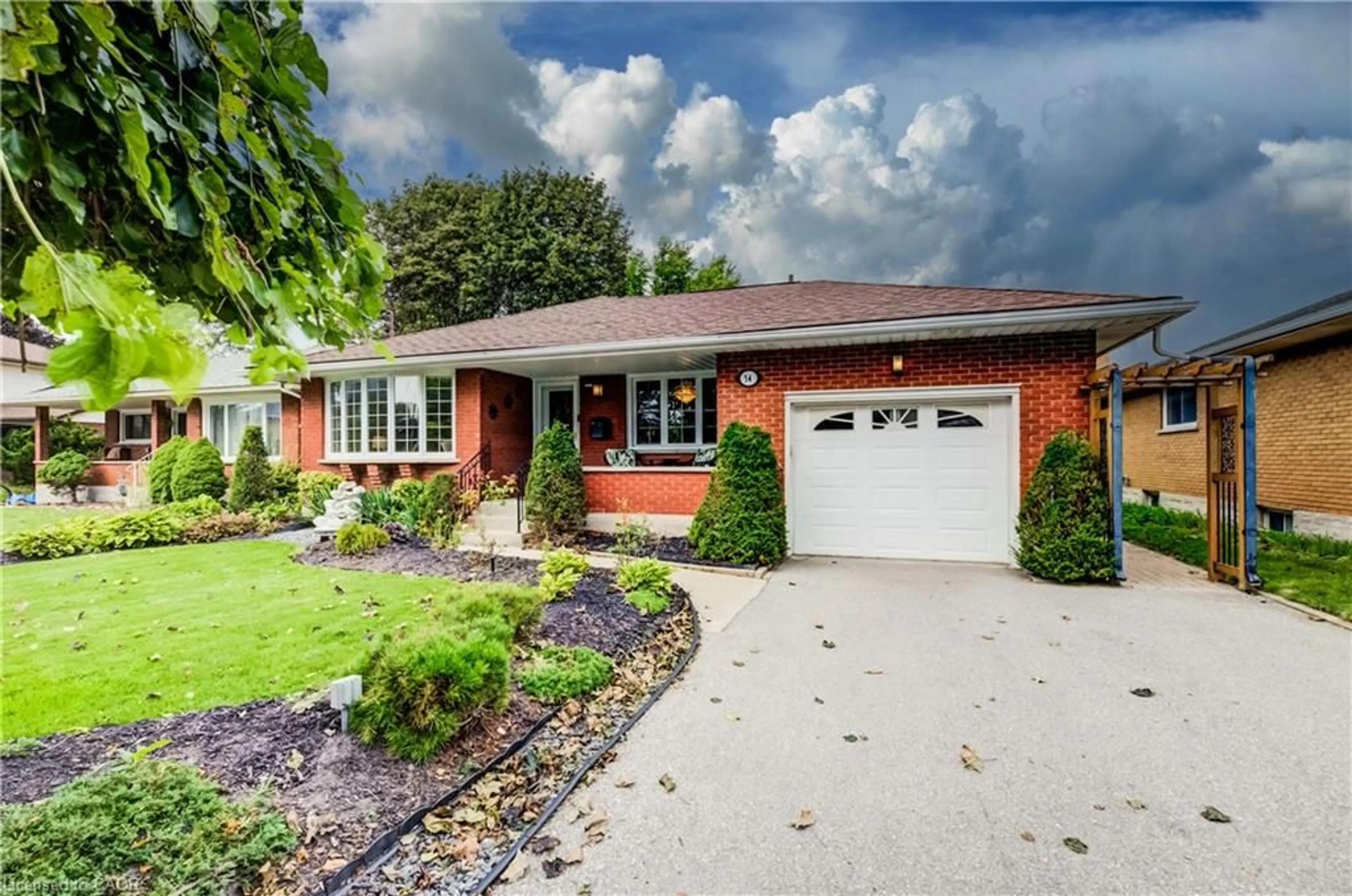 Home with brick exterior material, street for 54 Fairlawn Rd, Kitchener Ontario N2C 1X9