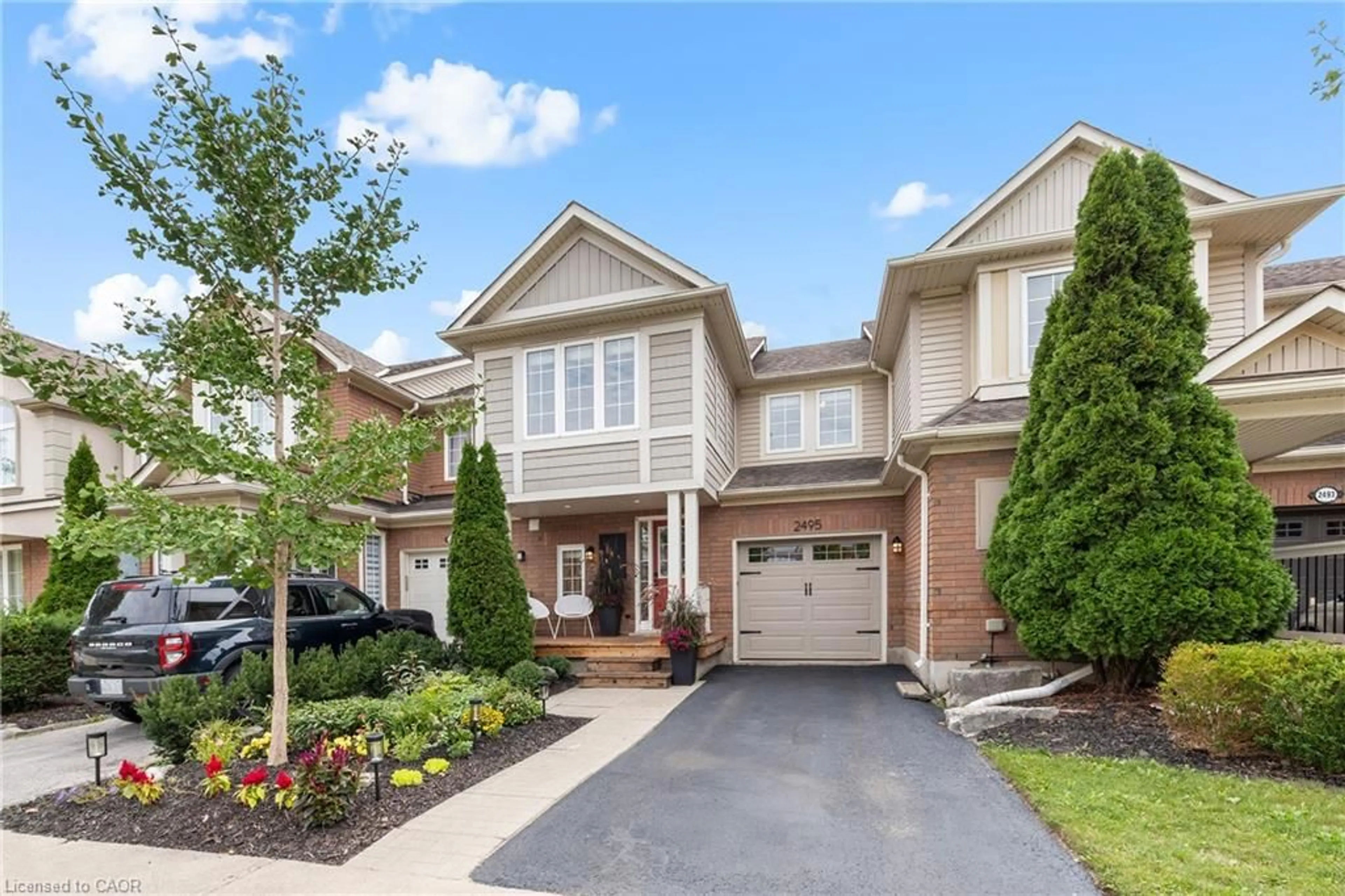 Home with brick exterior material, street for 2495 Wooden Hill Cir, Oakville Ontario L6M 4E3