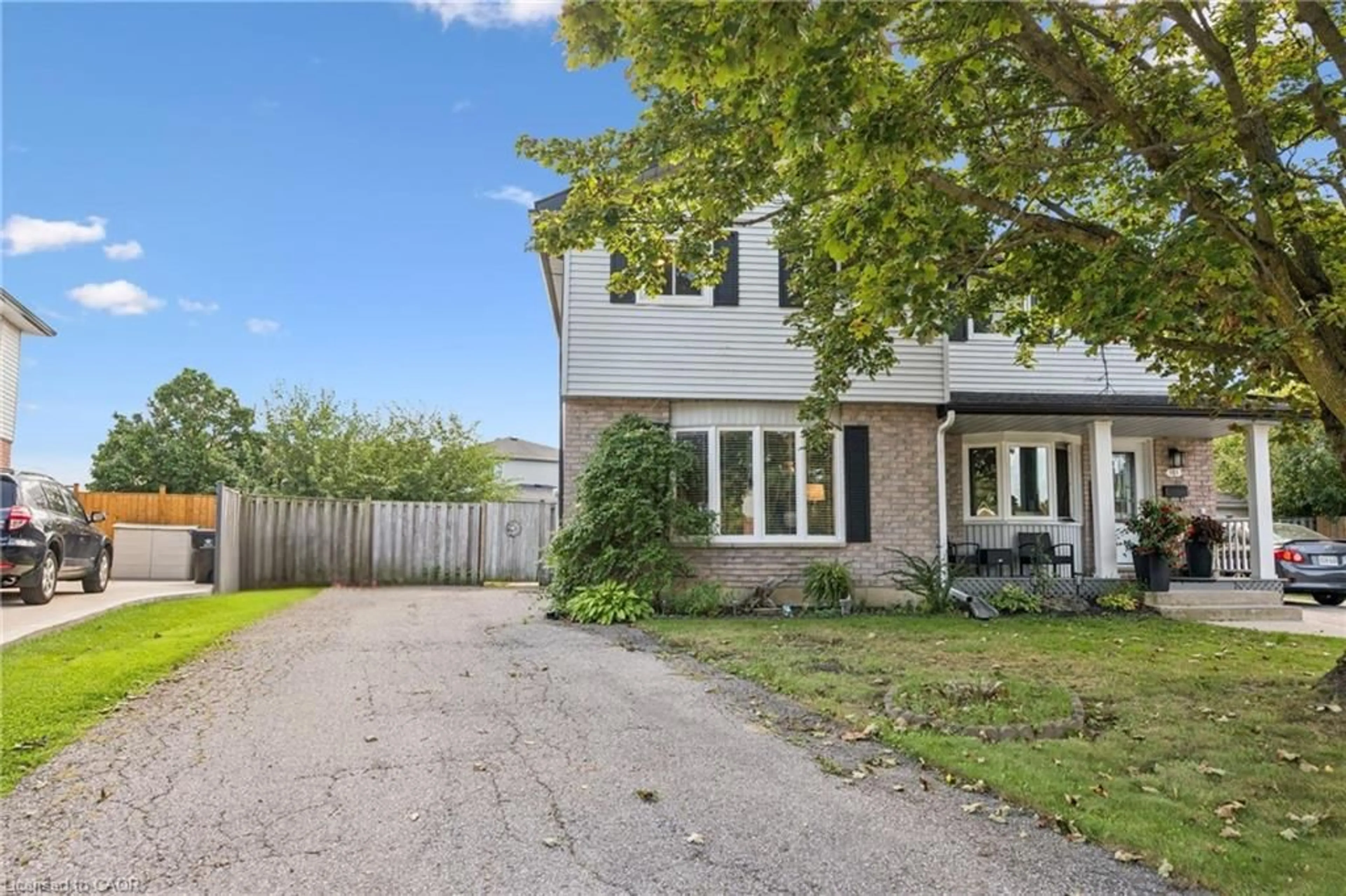 A pic from outside/outdoor area/front of a property/back of a property/a pic from drone, street for 149 Ironstone Dr, Cambridge Ontario N1P 1A4