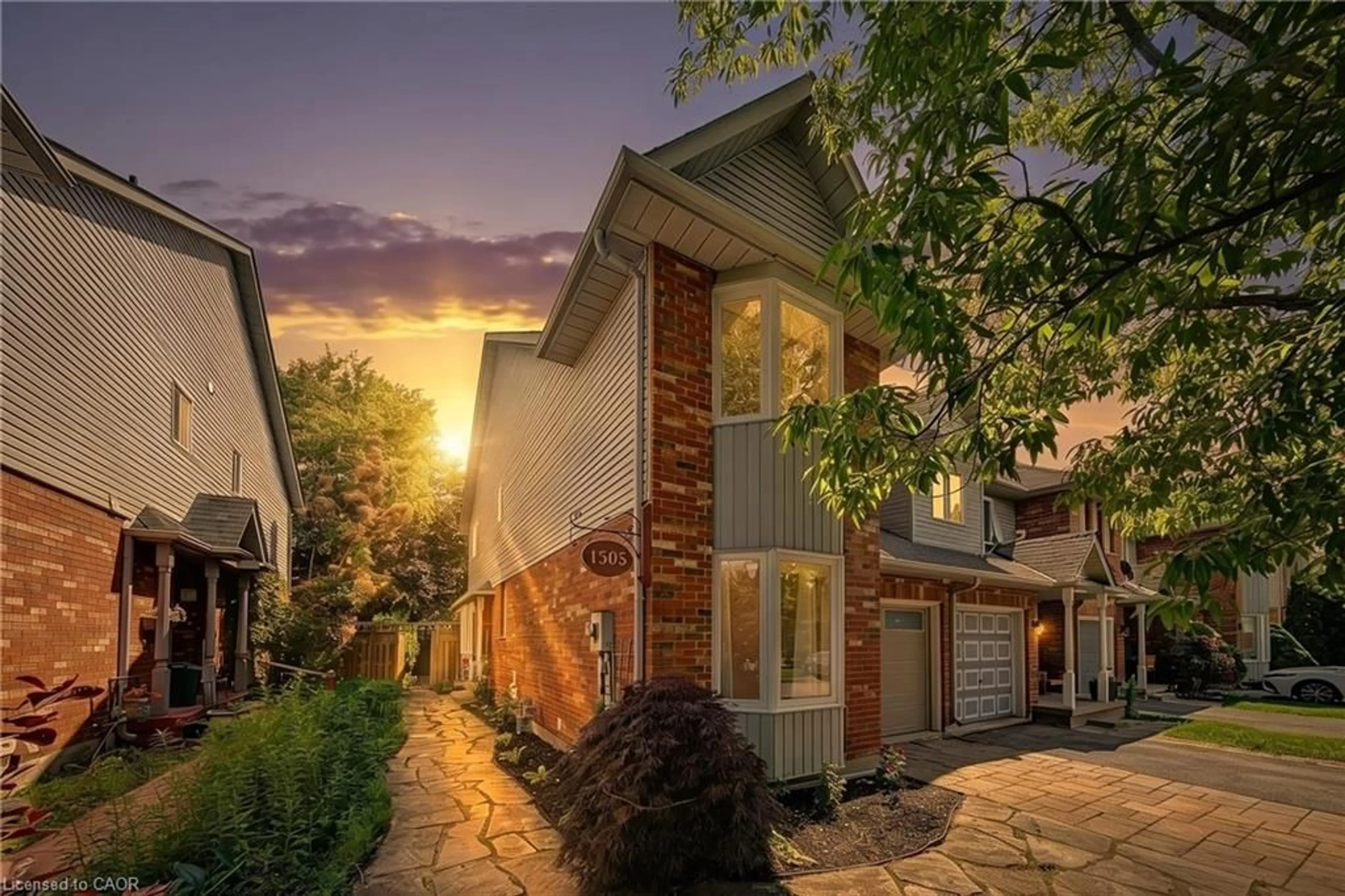 Home with brick exterior material, street for 1305 Walker's Line, Burlington Ontario L7M 4N7