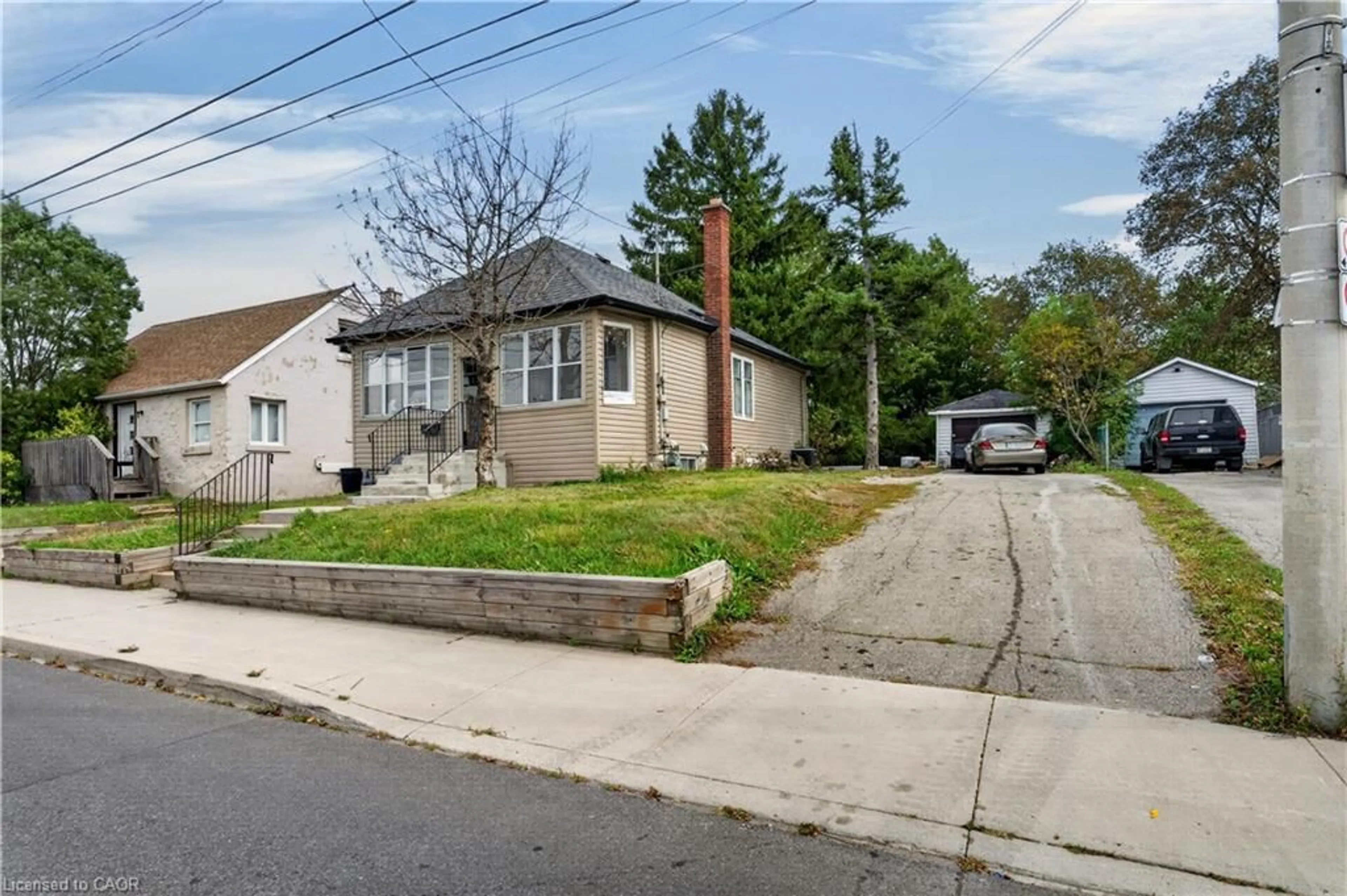 A pic from outside/outdoor area/front of a property/back of a property/a pic from drone, street for 241 West 5th St, Hamilton Ontario L9C 3N8
