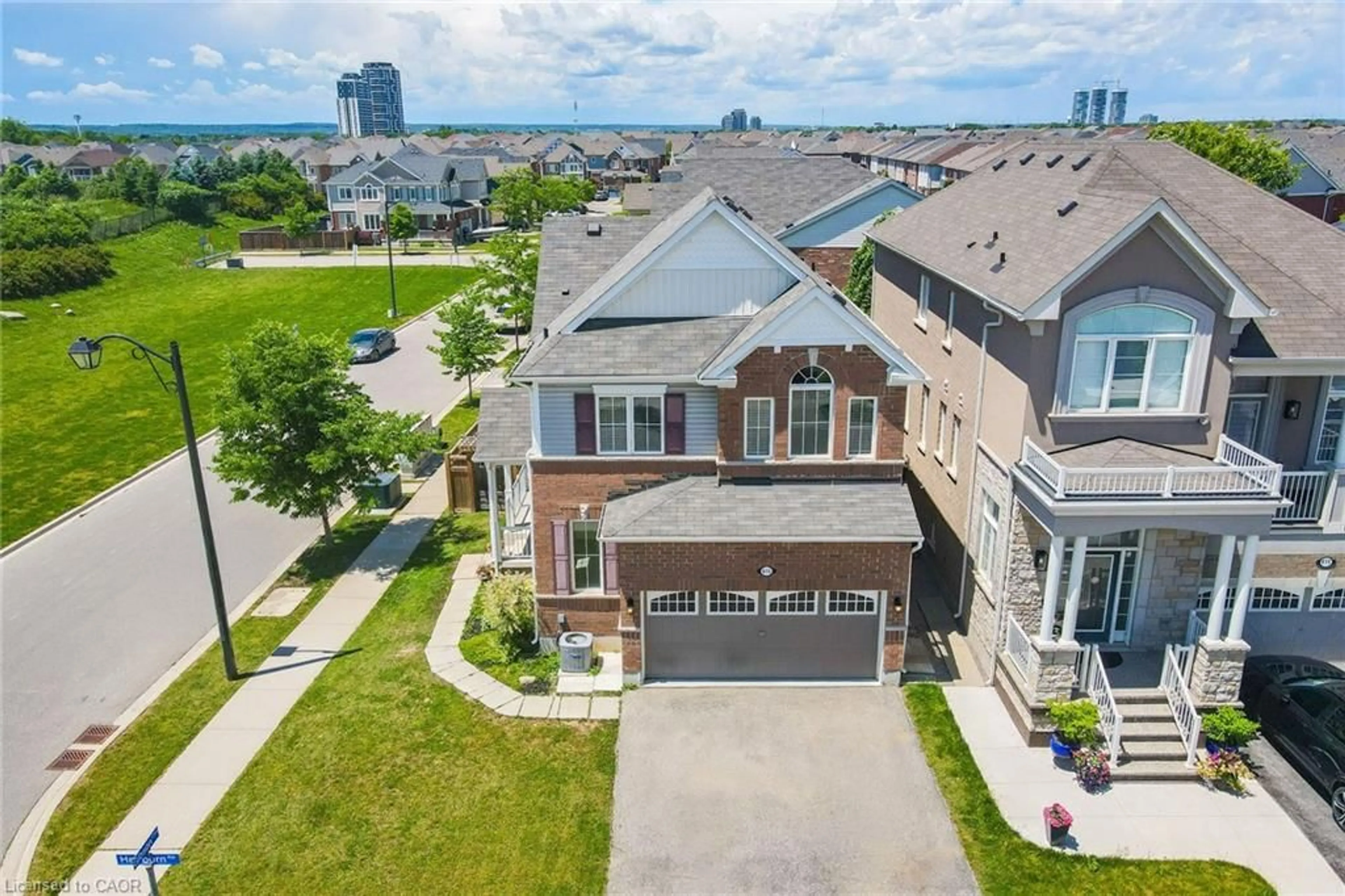 A pic from outside/outdoor area/front of a property/back of a property/a pic from drone, street for 615 Hepburn Rd, Milton Ontario L9T 8Z6