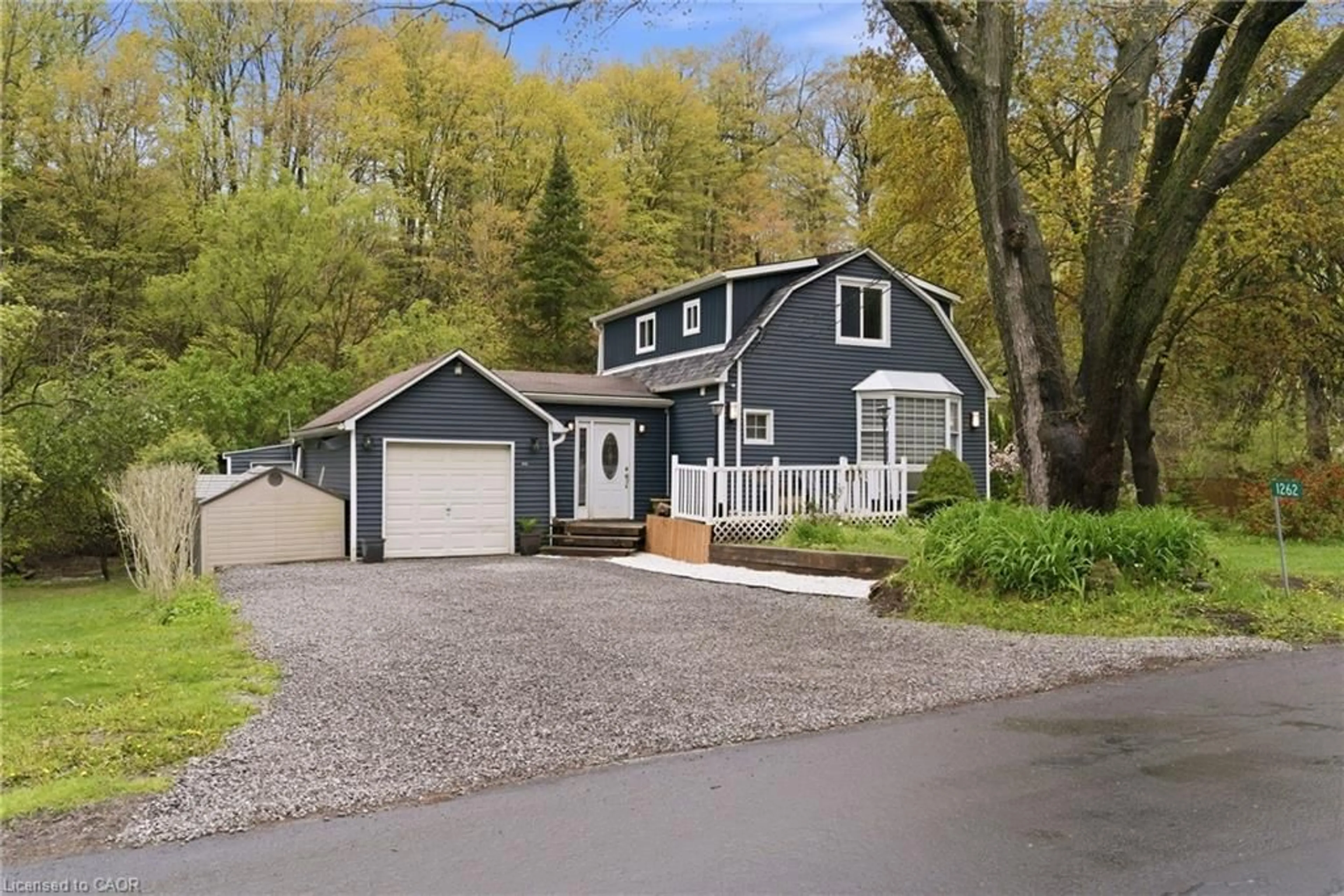 Home with vinyl exterior material, street for 1262 Hidden Valley Rd, Burlington Ontario L7P 0T5