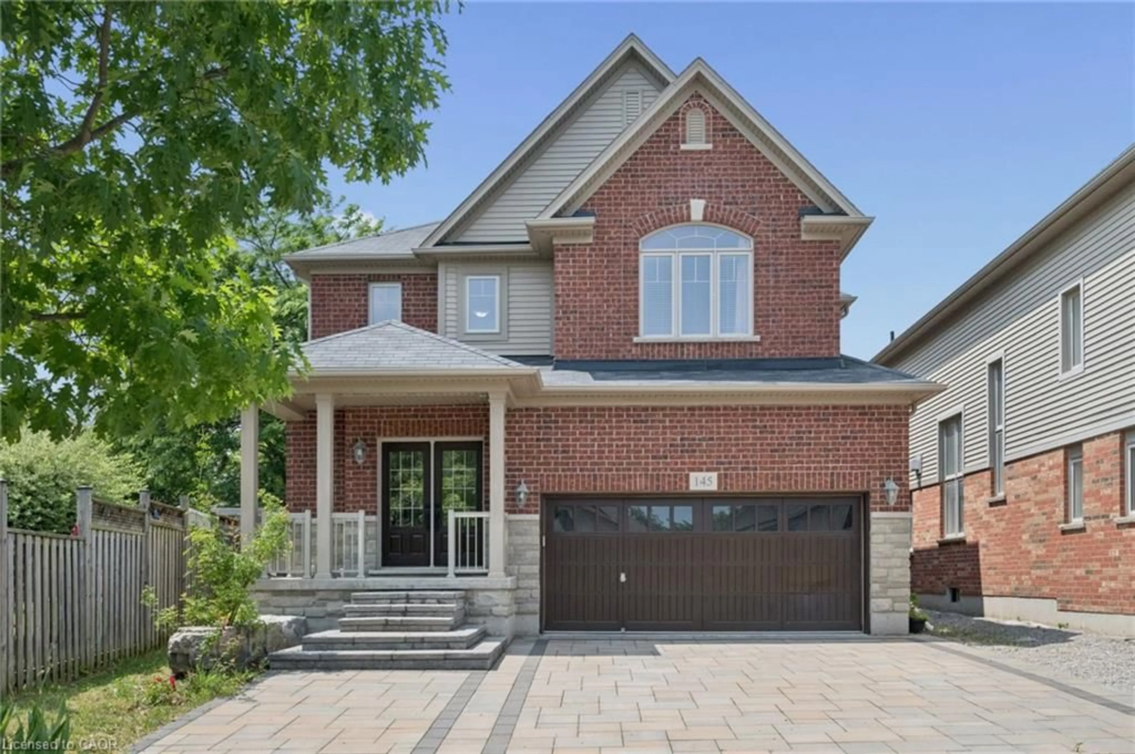 Home with brick exterior material, street for 145 Redtail St, Kitchener Ontario N2K 4J5