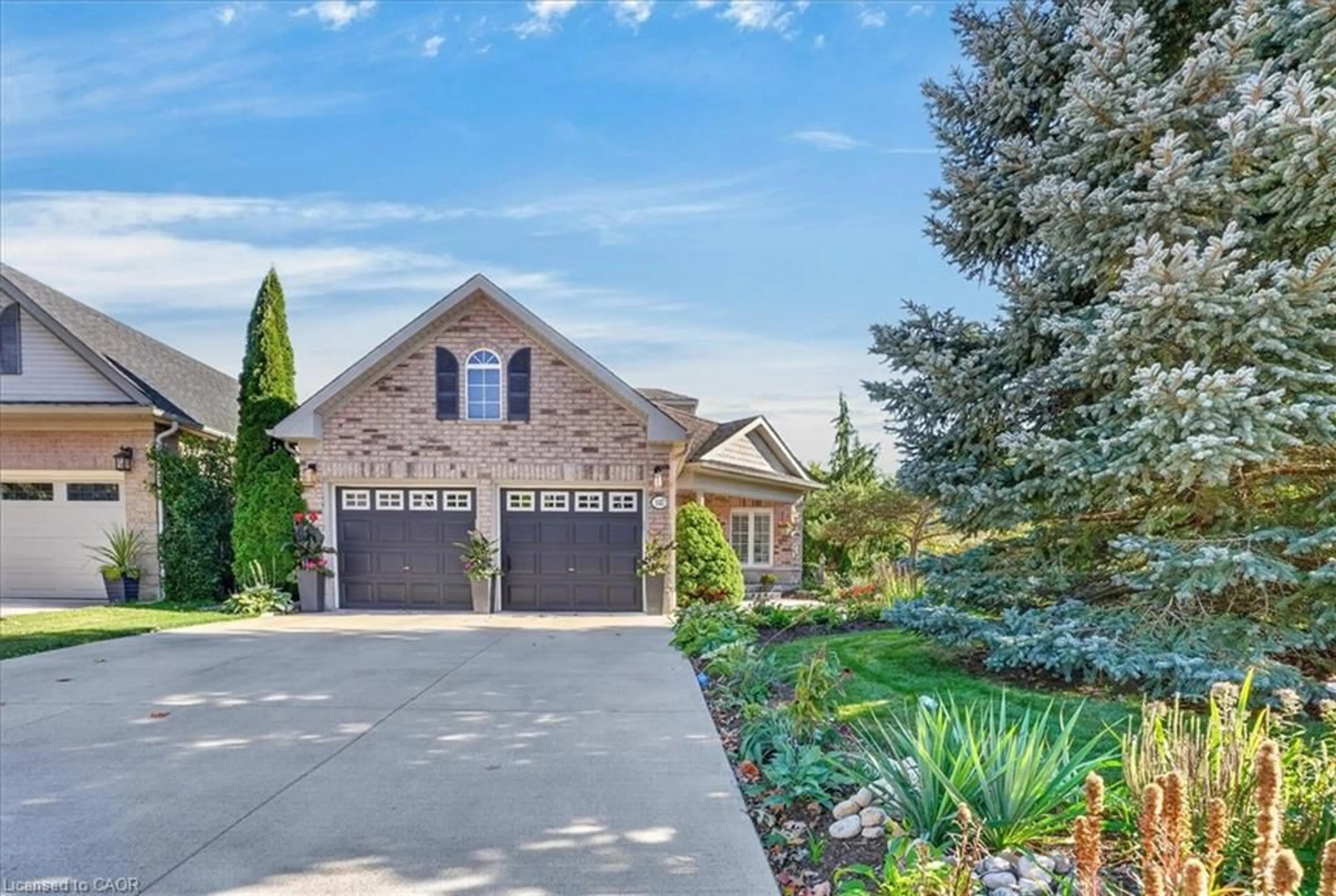 Home with brick exterior material, street for 147 Reiber Crt, Waterloo Ontario N2L 6N2