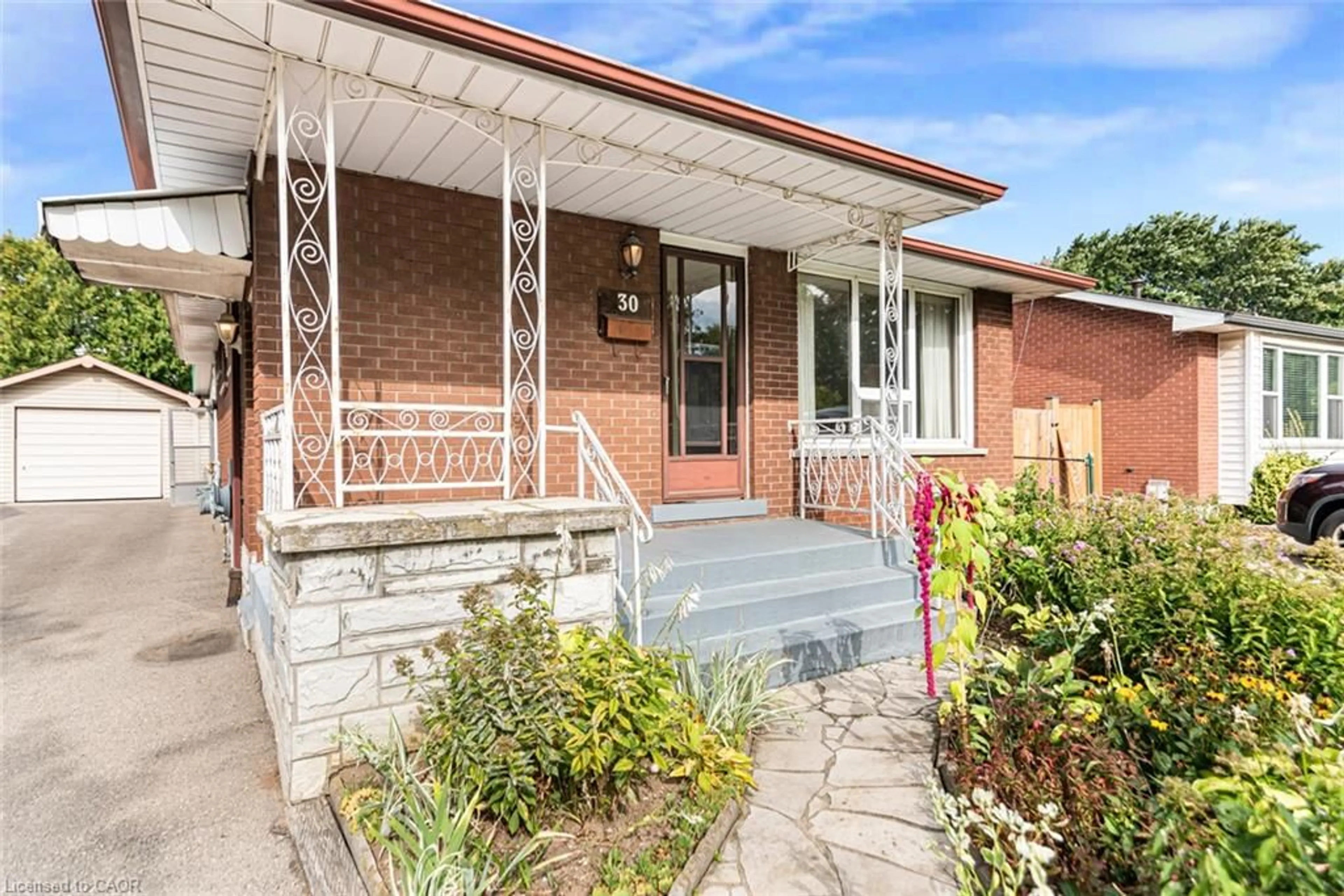 Home with brick exterior material, street for 30 Goldfinch Rd, Hamilton Ontario L9A 3W7
