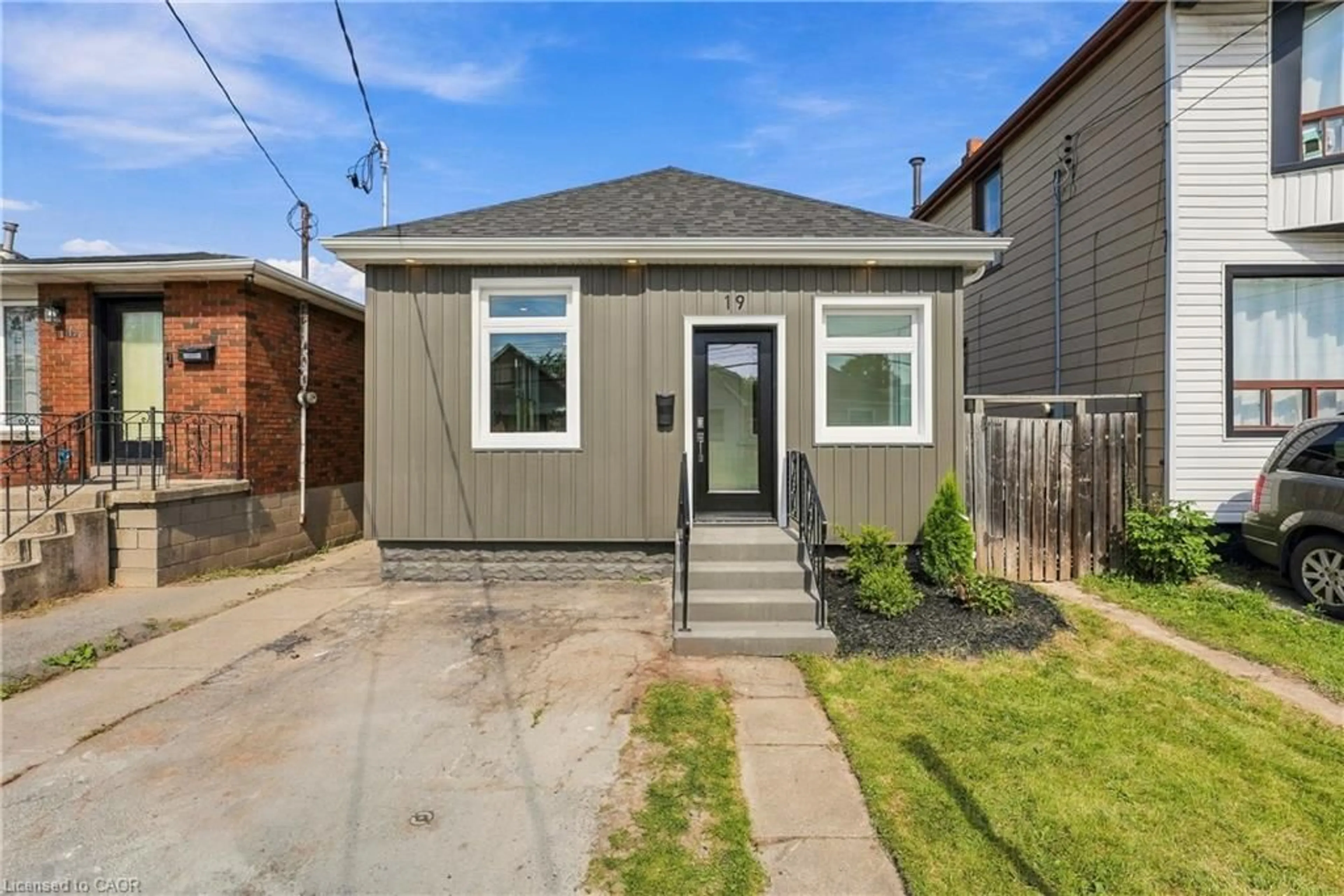 Home with brick exterior material, street for 19 Vansitmart Ave, Hamilton Ontario L8H 3A2