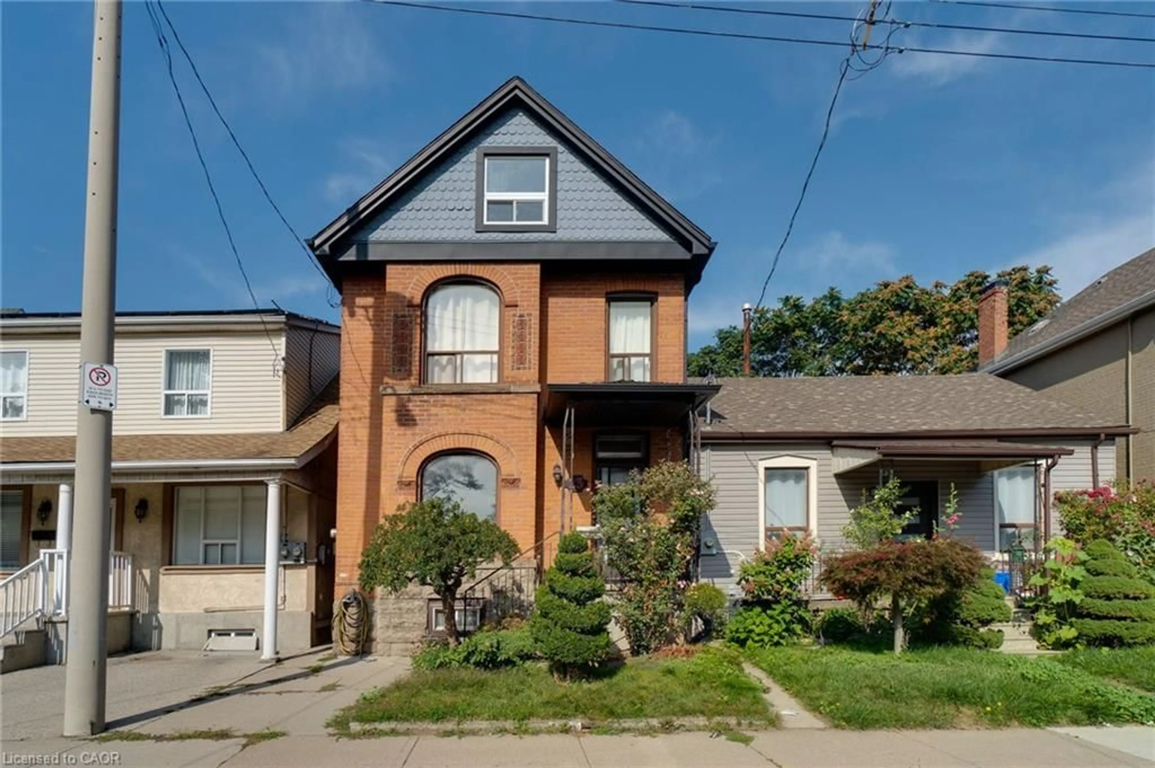 Home with brick exterior material, street for 23 Oak Ave, Hamilton Ontario L8L 5M7