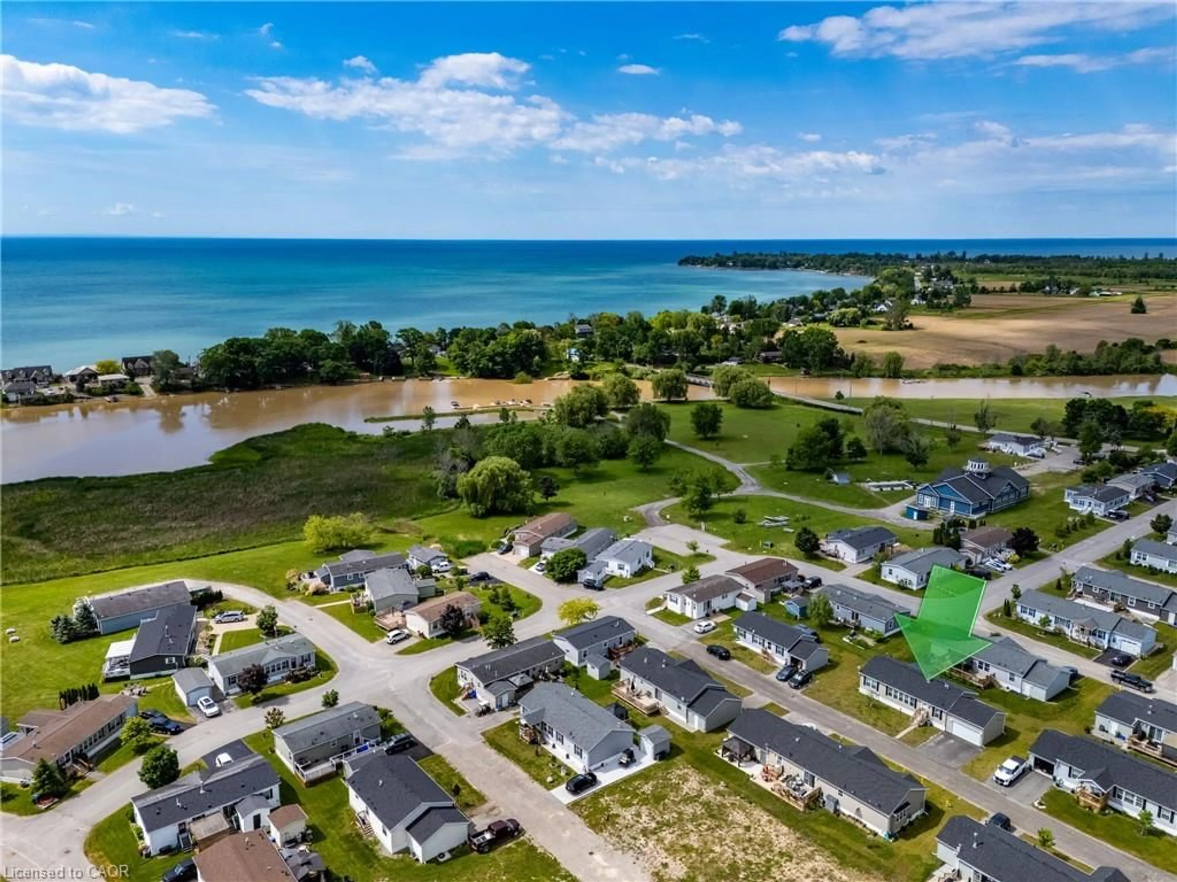 A pic from outside/outdoor area/front of a property/back of a property/a pic from drone, water/lake/river/ocean view for 11 Hickory Hollow, Nanticoke Ontario N0A 1P0