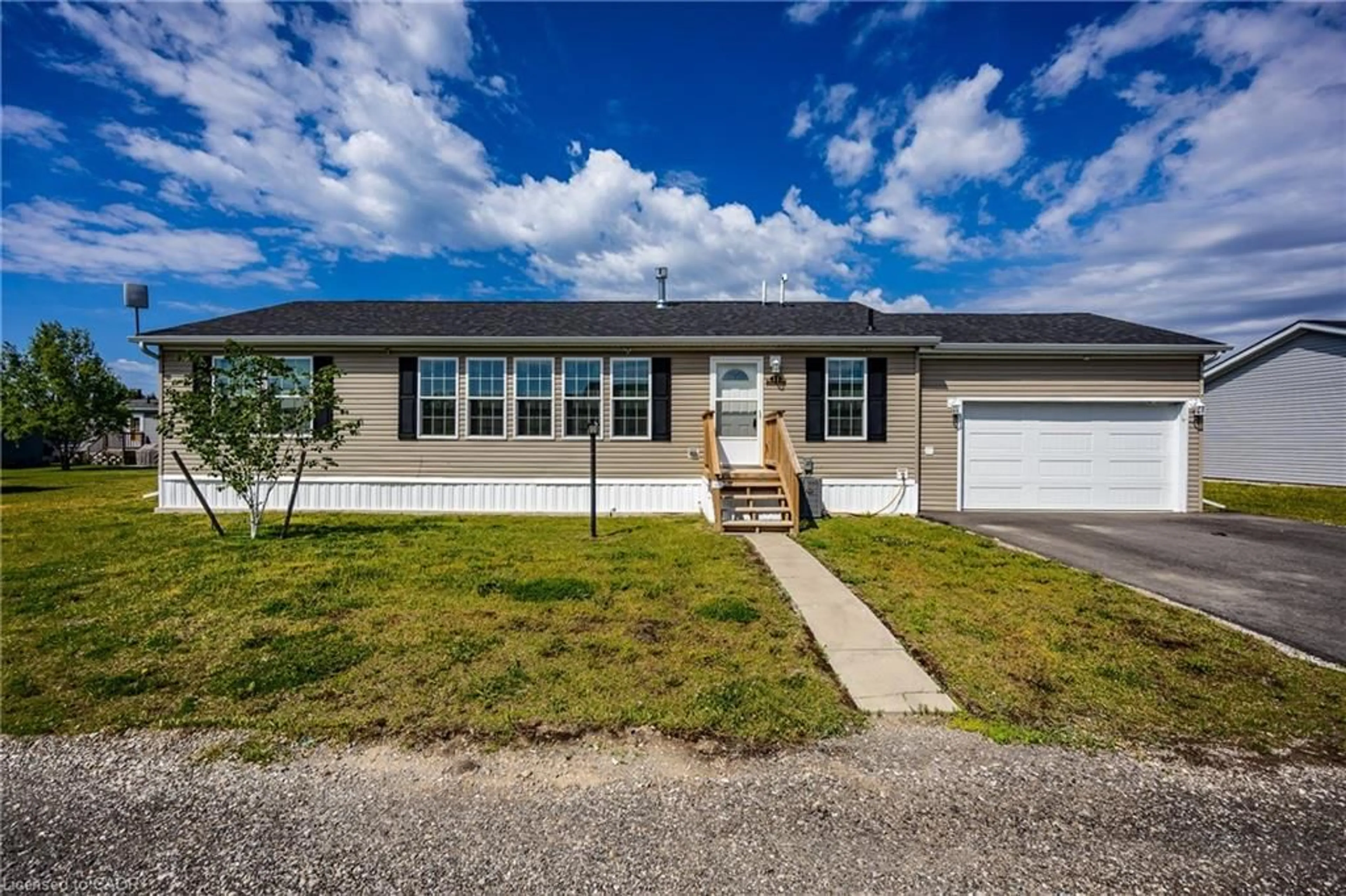 Home with vinyl exterior material, street for 11 Hickory Hollow, Nanticoke Ontario N0A 1P0