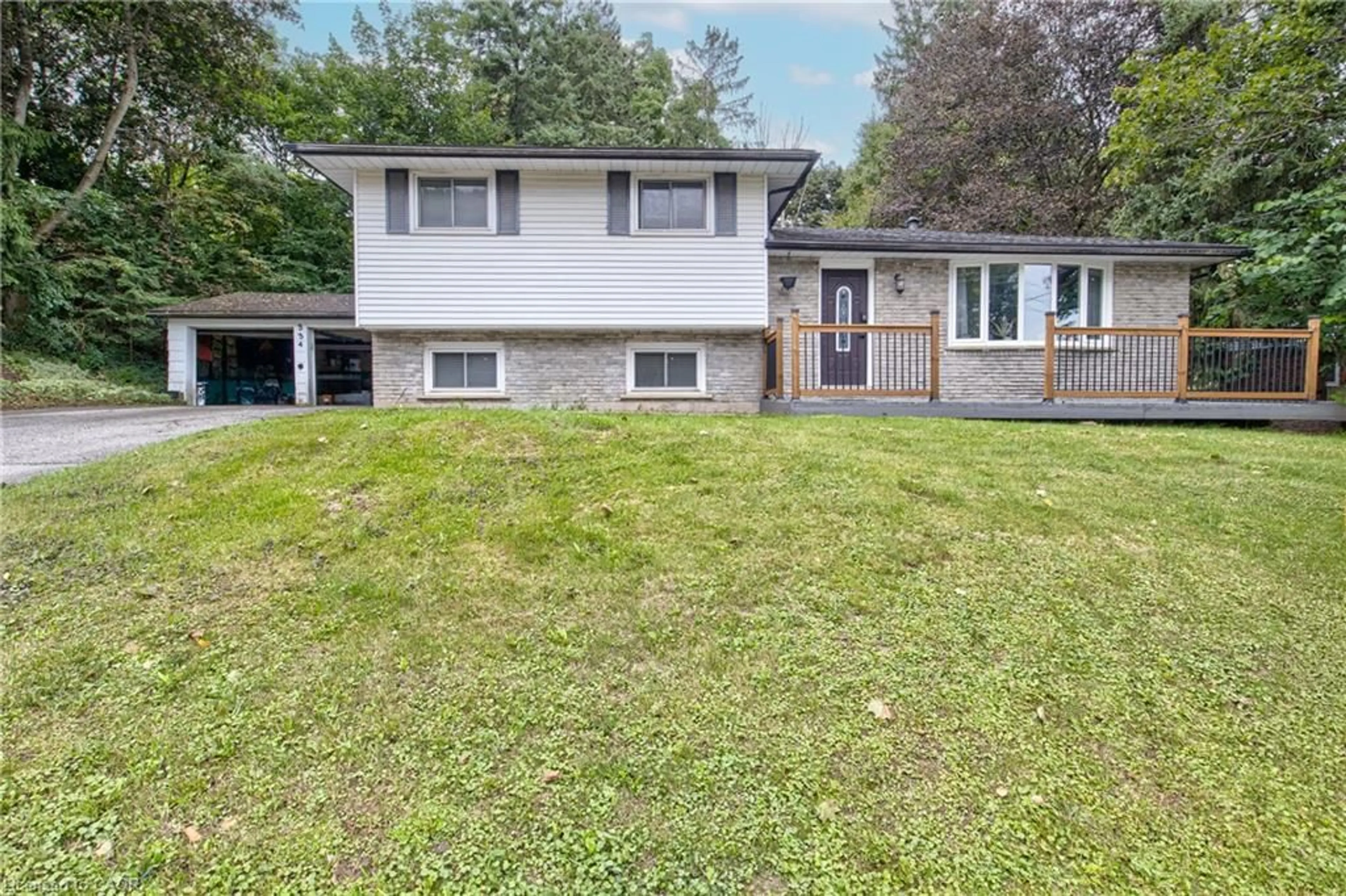 Home with vinyl exterior material, street for 334 Mill St, Woodstock Ontario N4S 2X7
